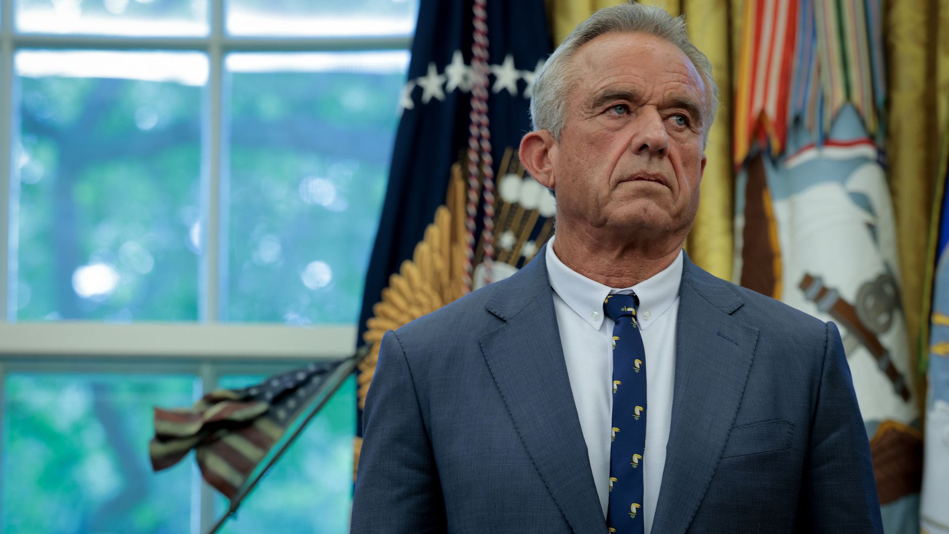 Robert F. Kennedy Jr in front of a window