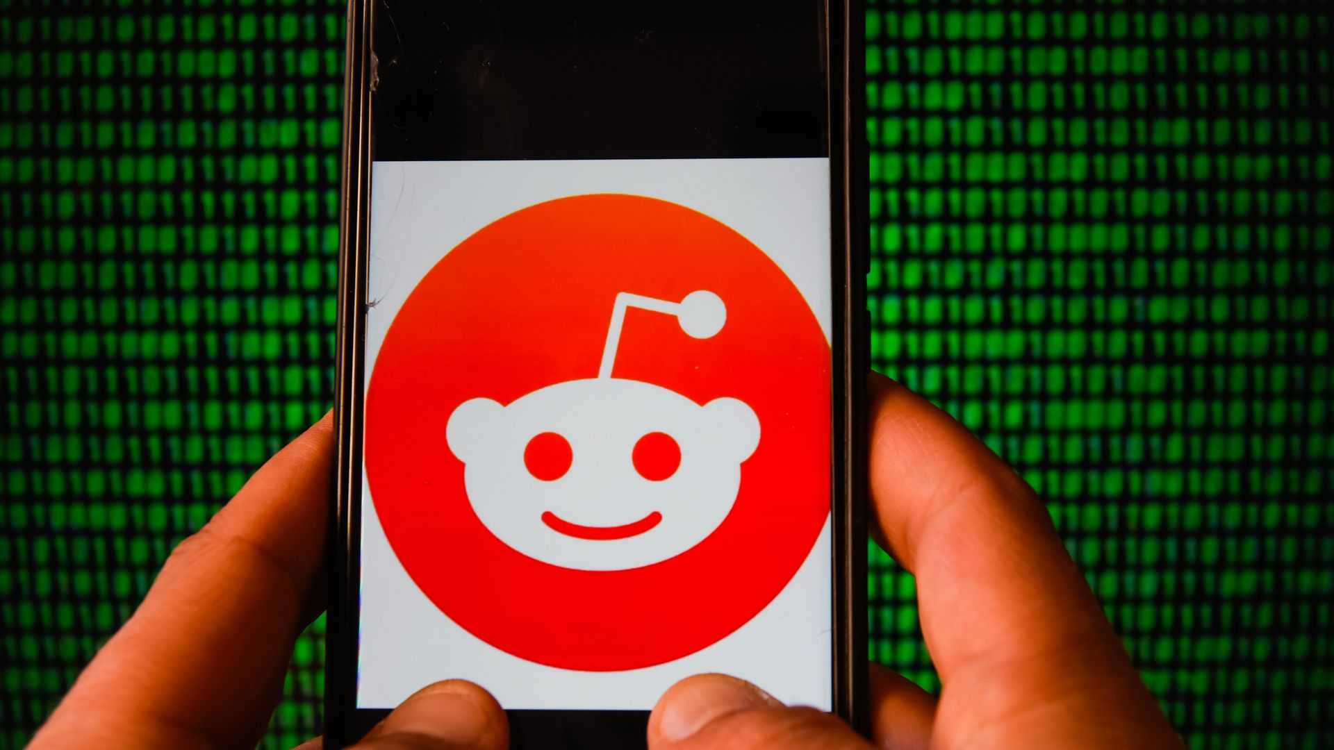 Photo of Reddit logo on a smartphone