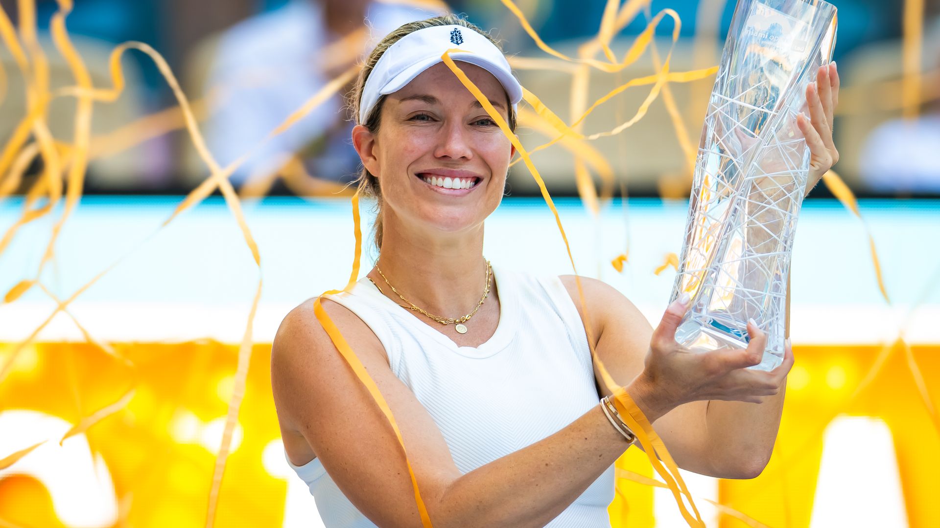 Danielle Collins of the United States poses with the champions trophy after defeating Elena Rybakina of Kazakhstan in the womens singles final on Day 15 of the Miami Open Presented by Itau at Hard Rock Stadium on March 30, 2024 in Miami Gardens, Florida. 