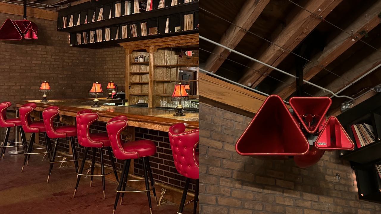Two-view scene of a warmly lit bar: left - red tufted leather bar stools along a wooden counter, brick walls, shelves, and small red lamps. Right - red triangular hanging seats against beams and brick wall.