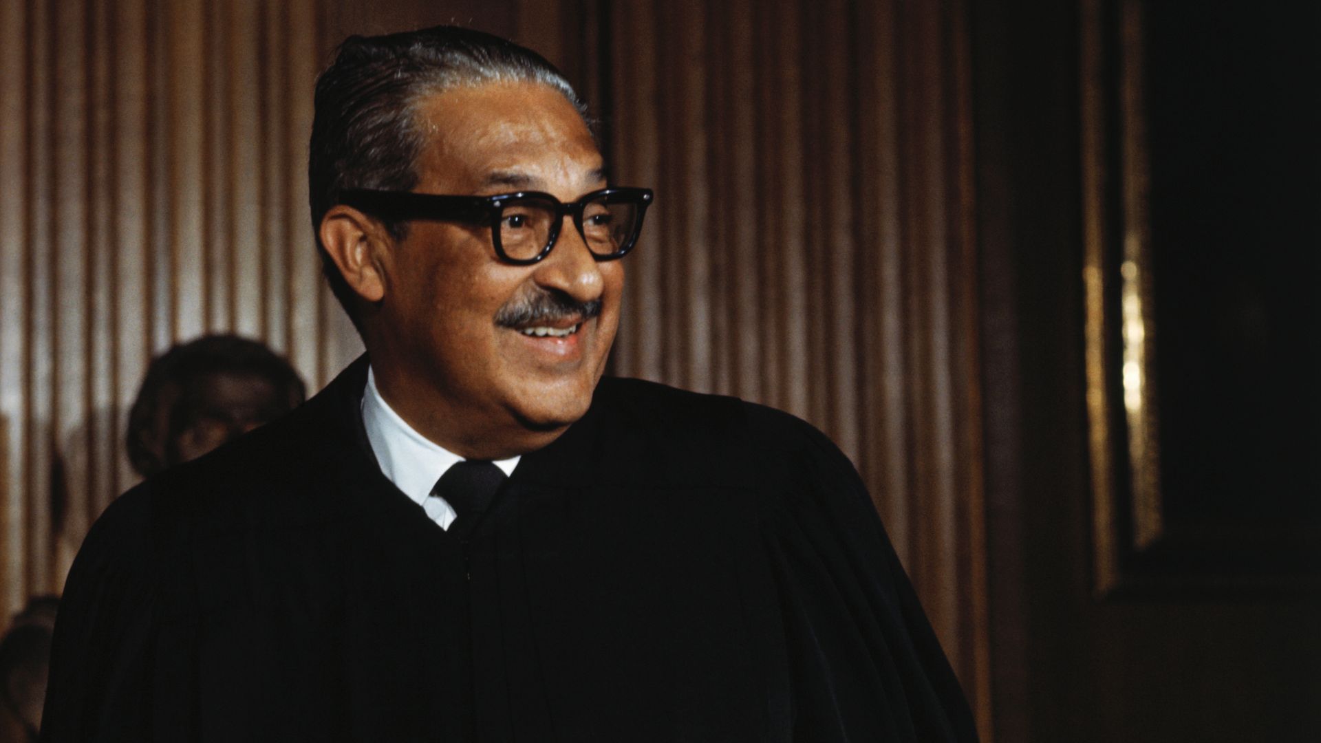 Thurgood Marshall in his robe prior to being sworn in as the first Black member of the U. S. Supreme Court in 1967.