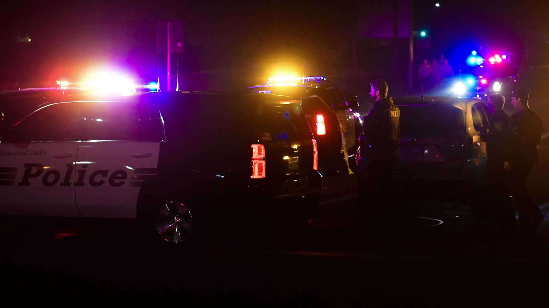 Police officers vehicles close off an area responding to a shooting at a bar in Thousand Oaks, California on November 8, 2018.
