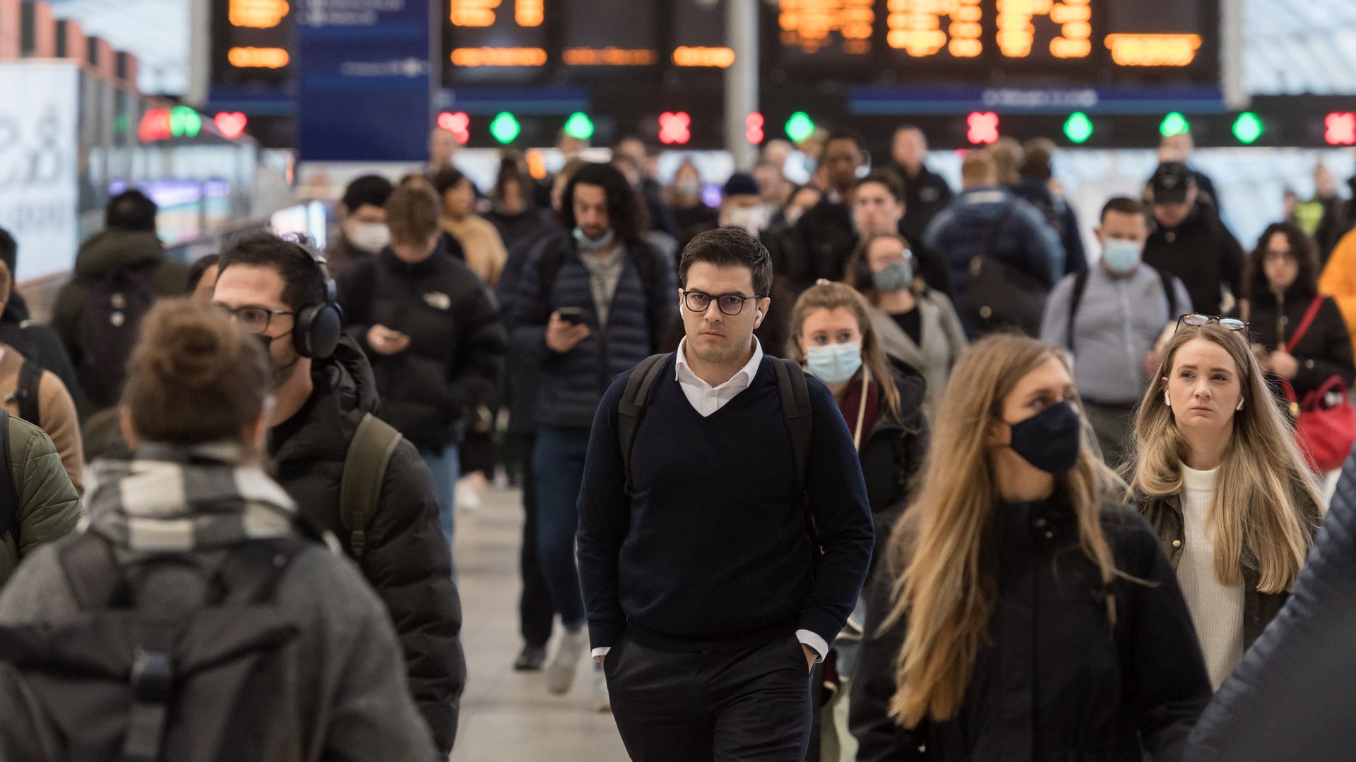 Commuters arrive at Waterloo station during morning rush hour as all of England's remaining Covid restrictions are set to end later this week on February 22, 2022 in London, England. 