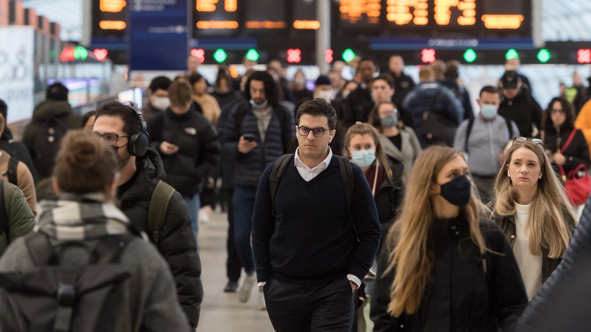 Commuters arrive at Waterloo station during morning rush hour as all of England's remaining Covid restrictions are set to end later this week on February 22, 2022 in London, England.