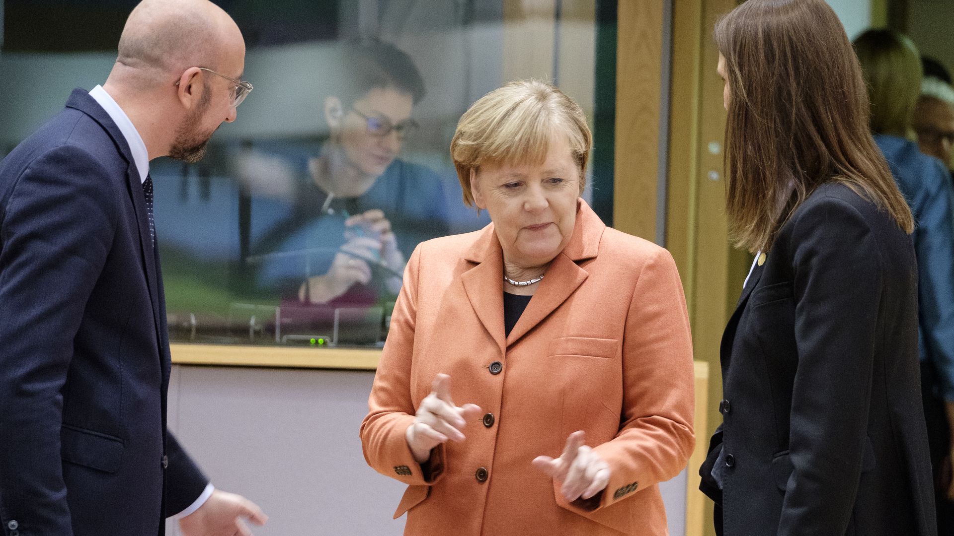 Angela Merkel with EU officials