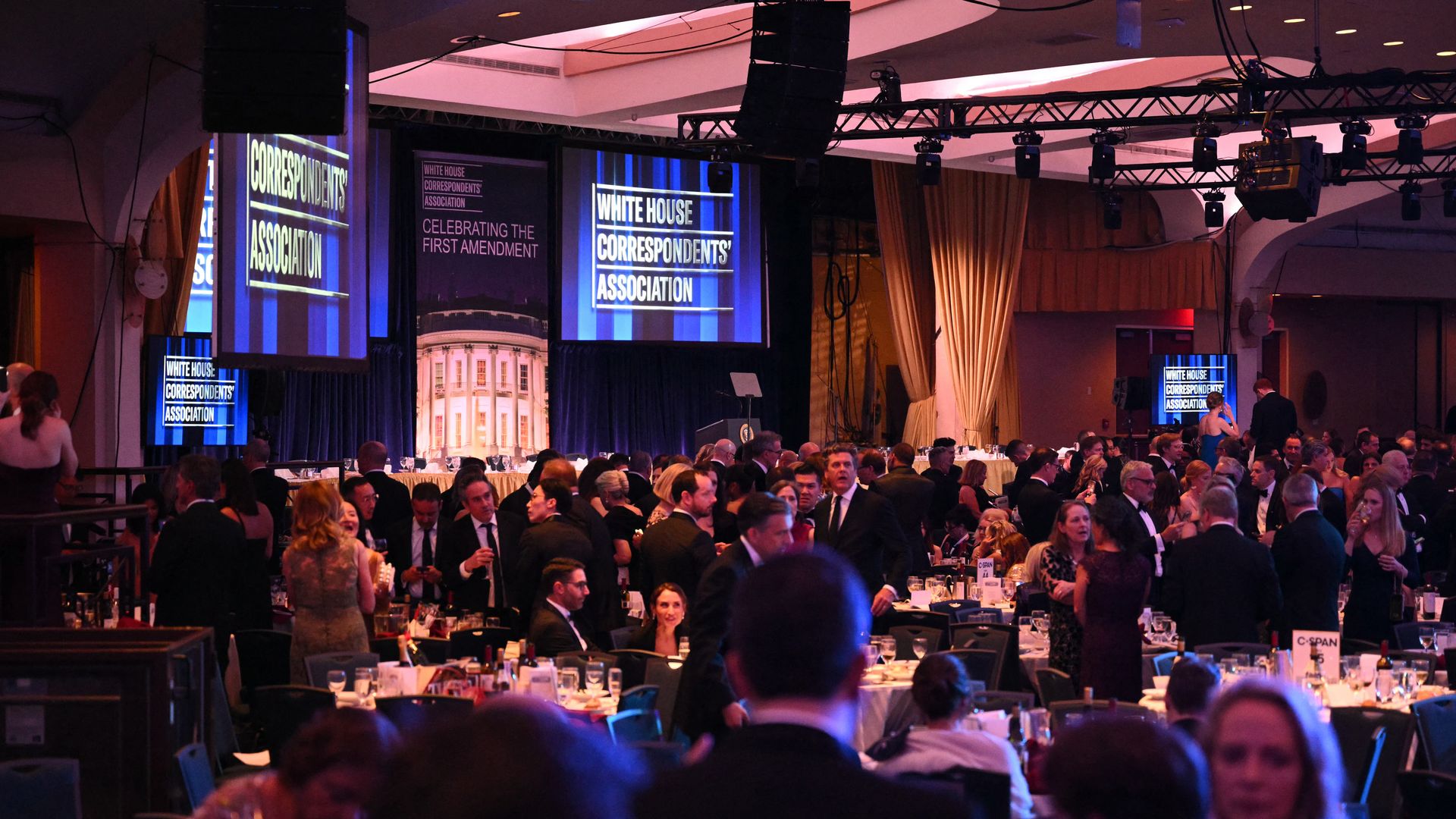 Attendees sit at tables at the White House Correspondents' Association dinner.