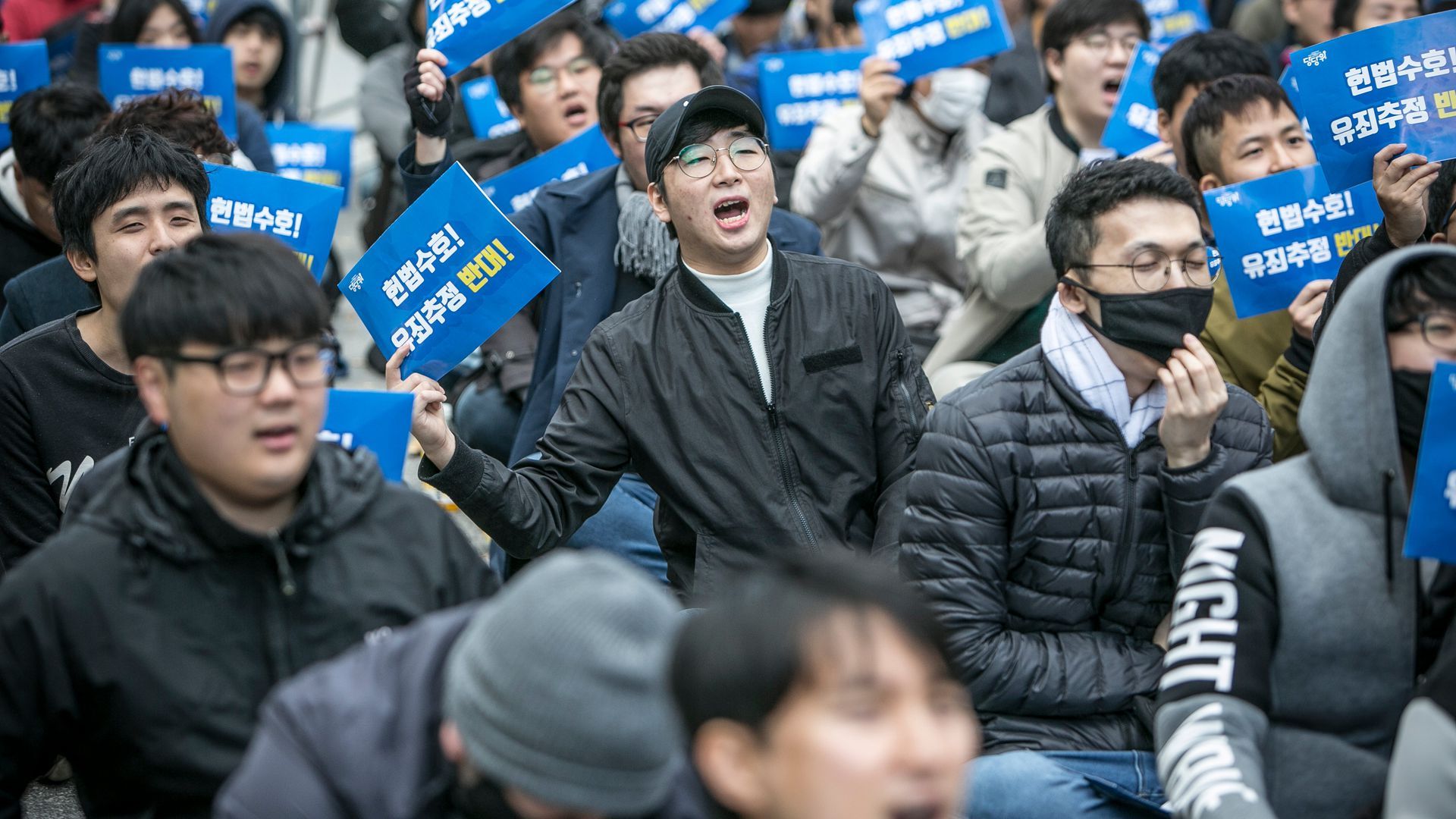 An anti-feminism protest in Seoul in October 2021. Photo: Jean Chung/Getty Images