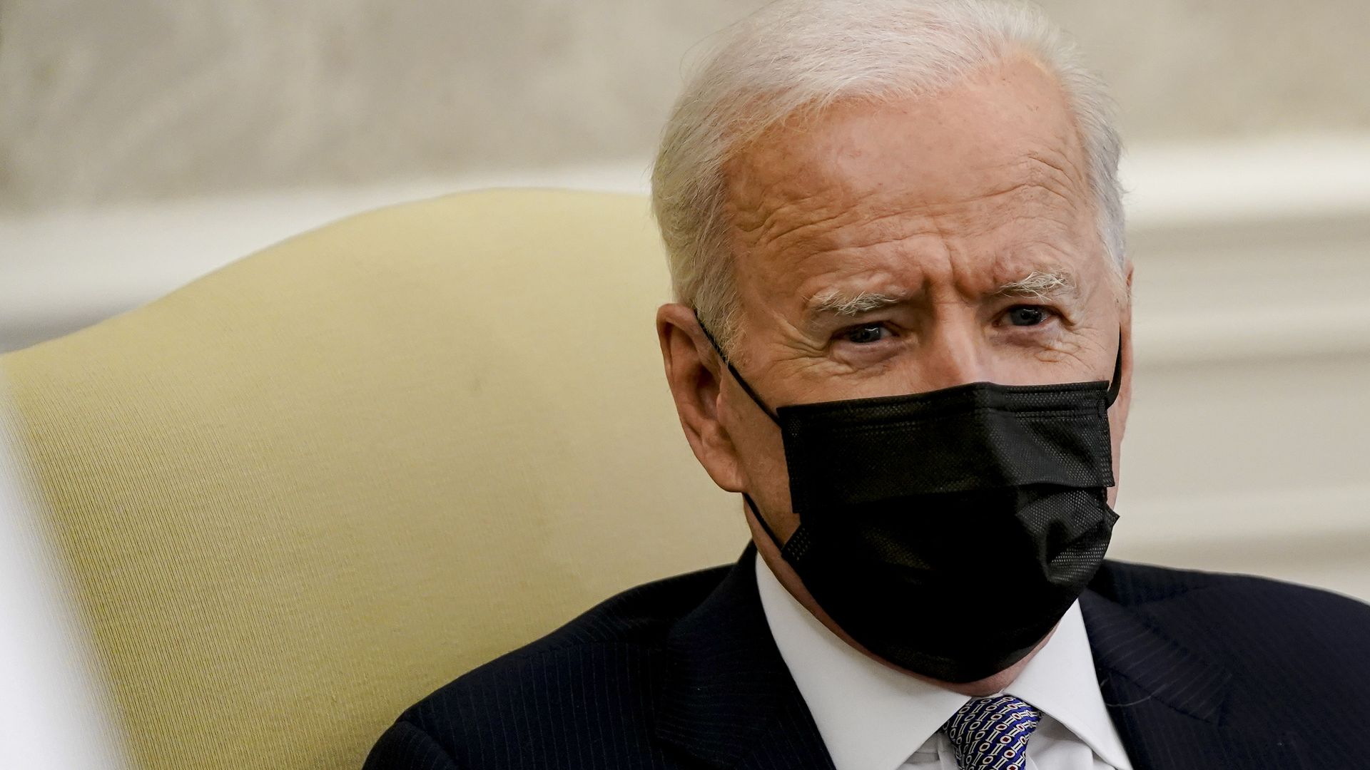 Photo of a masked Joe Biden