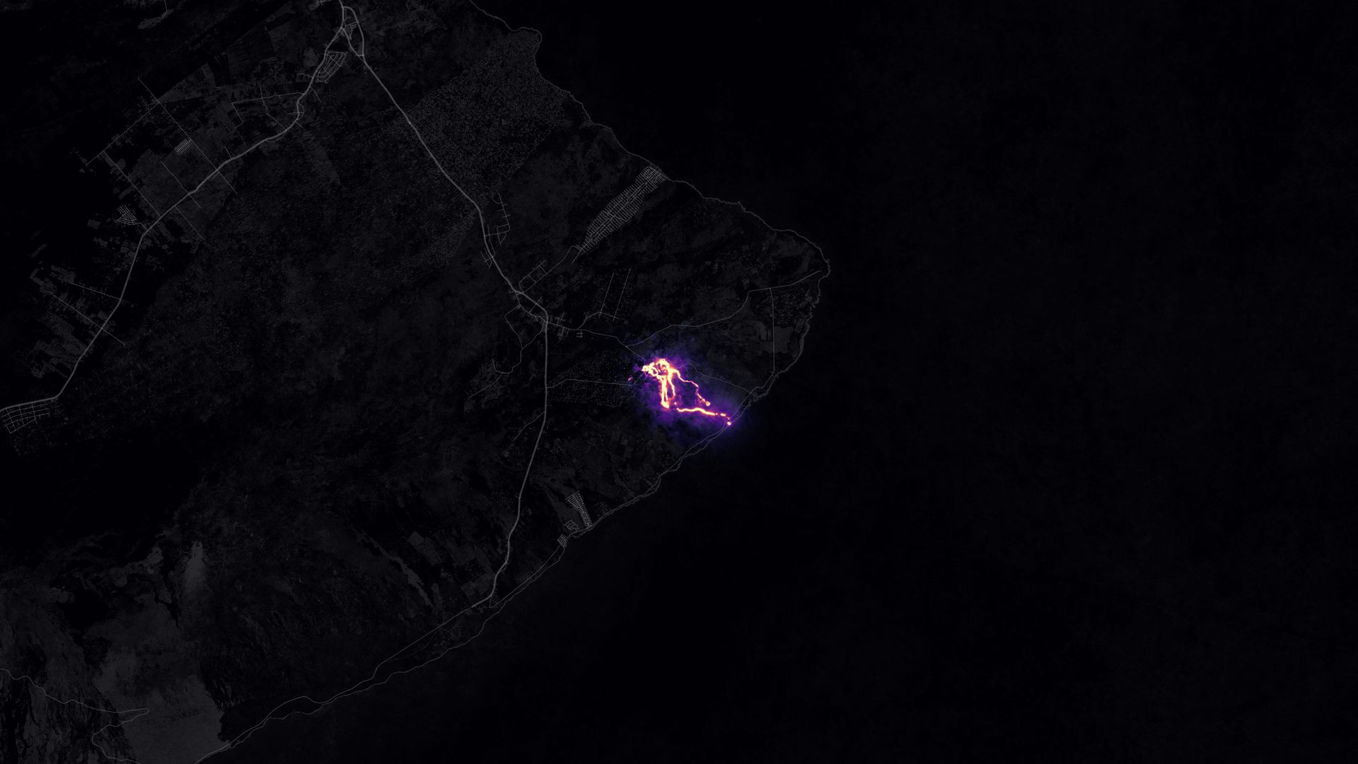 Satellite image showing lave from Mount Kilauea flowing at night on May 23, 2018.