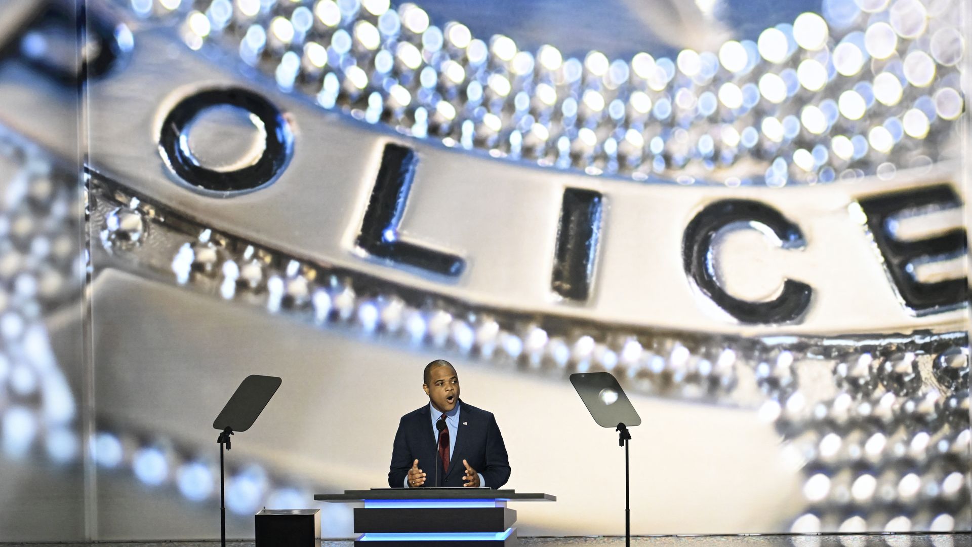 Dallas Mayor Eric Johnson stands before a police backdrop at the Republican National Convetion