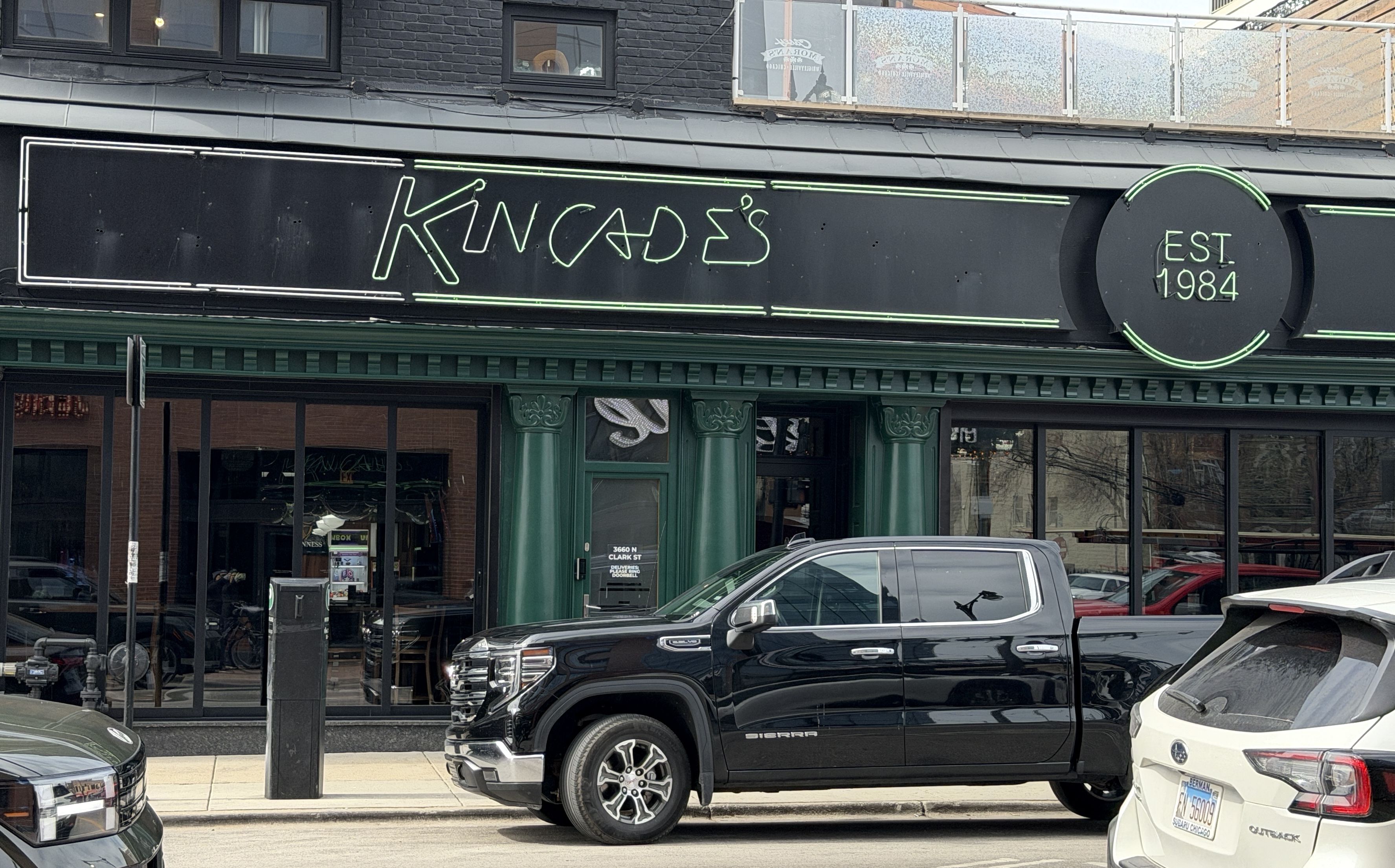Bar with truck in front.