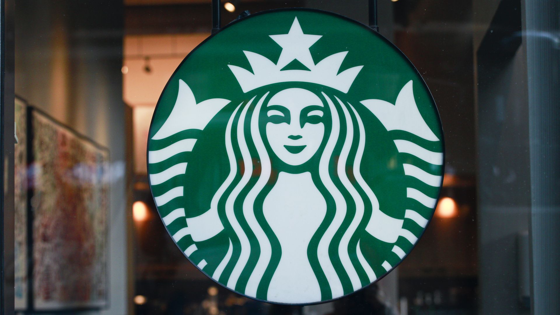 The Starbucks logo on a window
