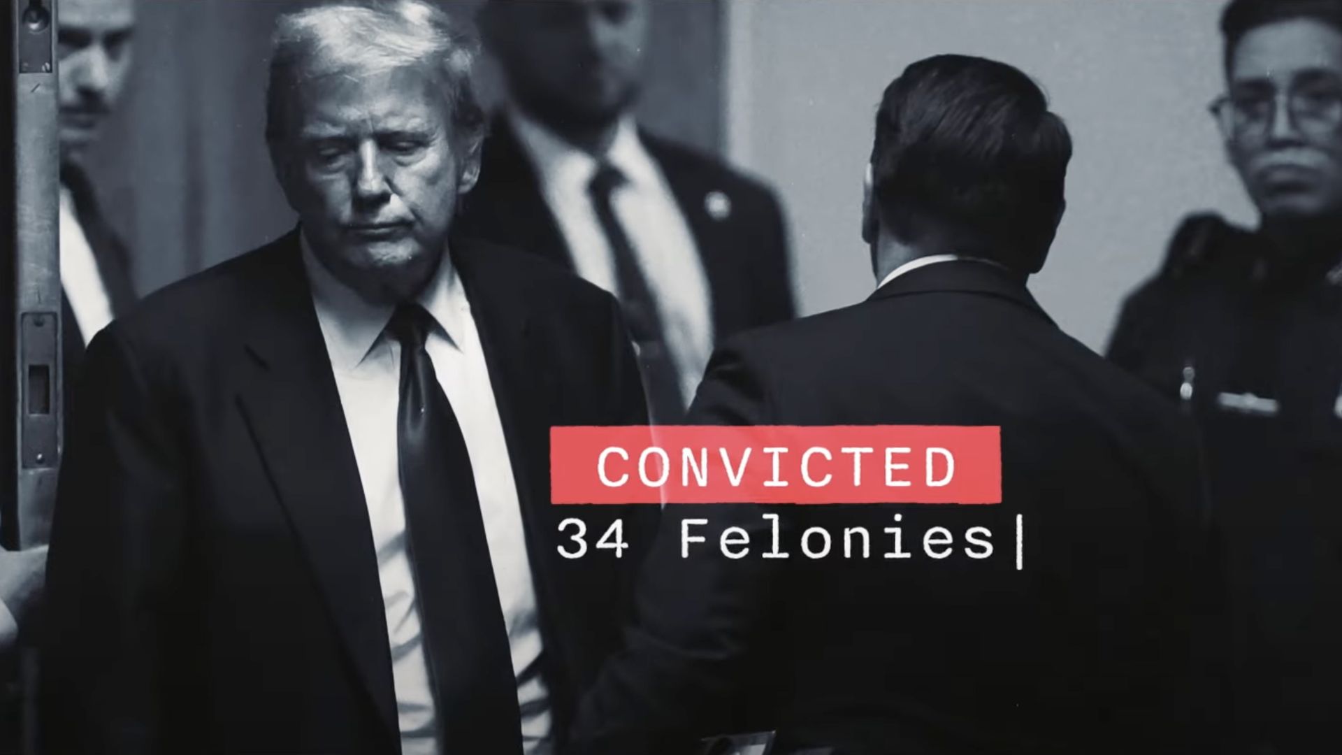 Trump in court with text noting that he has been convicted of 34 felonies