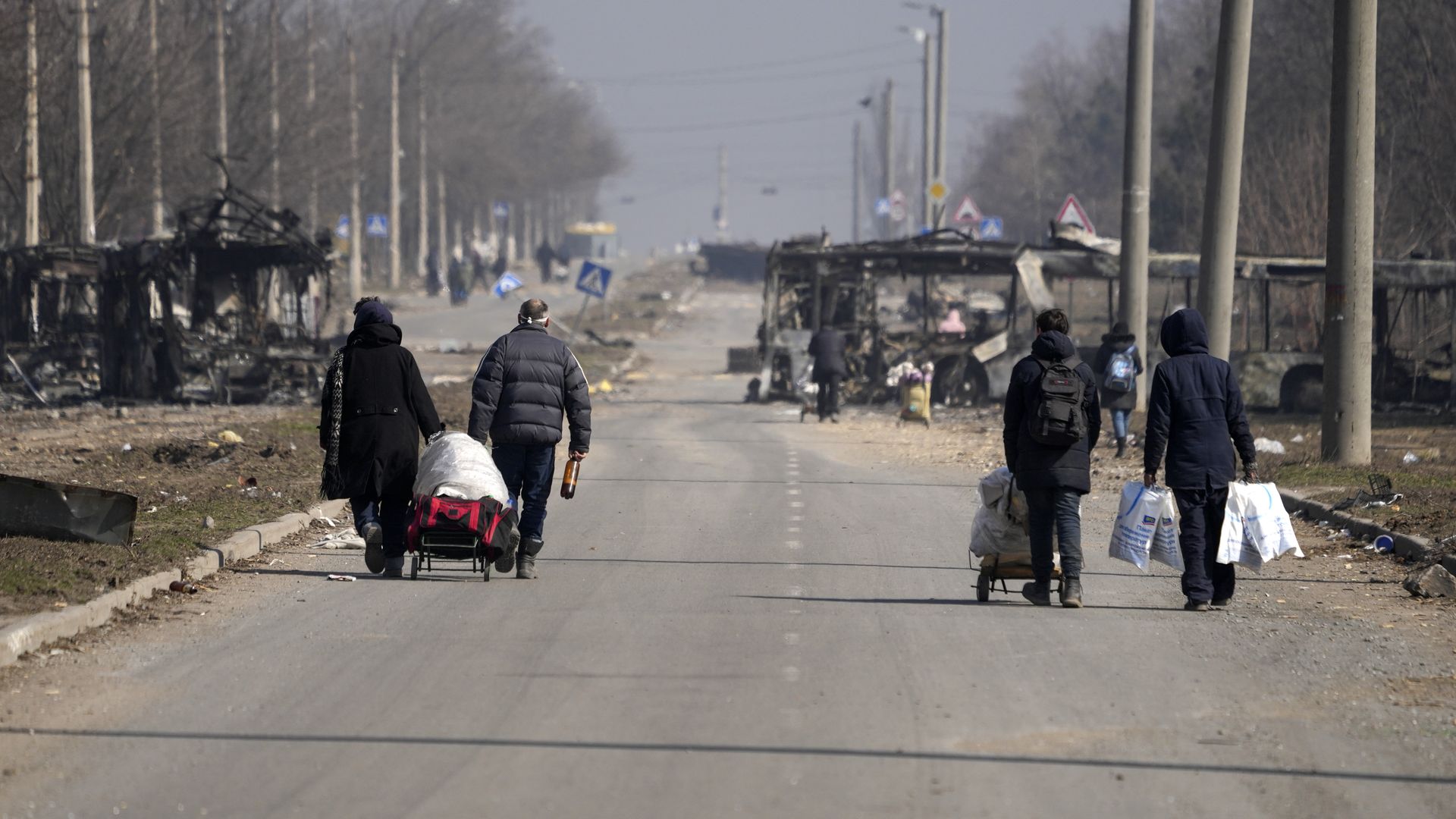 Civilians are being evacuated along humanitarian corridors from the Ukrainian city of Mariupol under the control of Russian military and pro-Russian separatists, on March 24, 2022