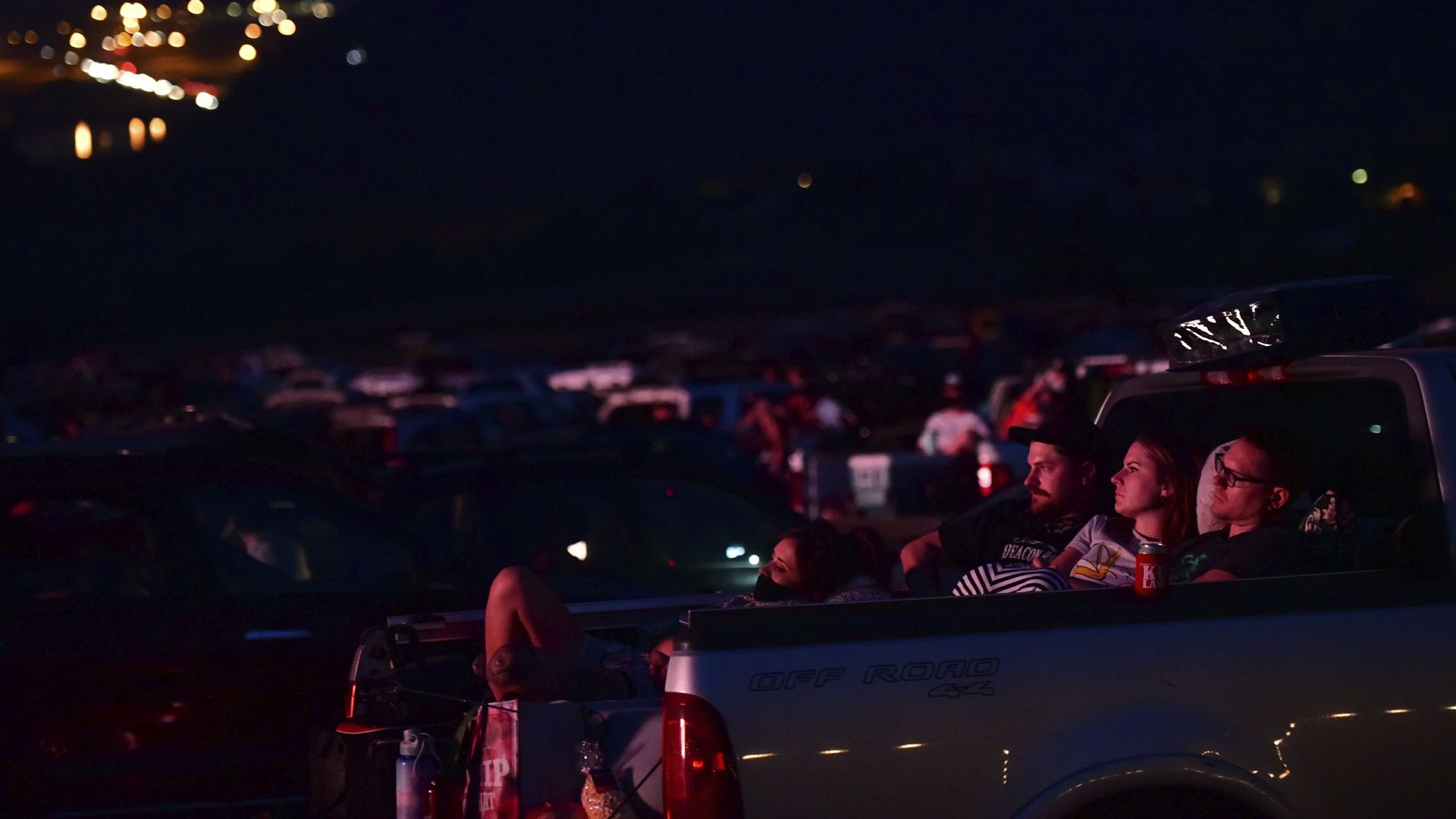 People attend a drive-in movie theater screening at the Red Rocks Amphitheatre. Photo: Mark Makela/Getty Images