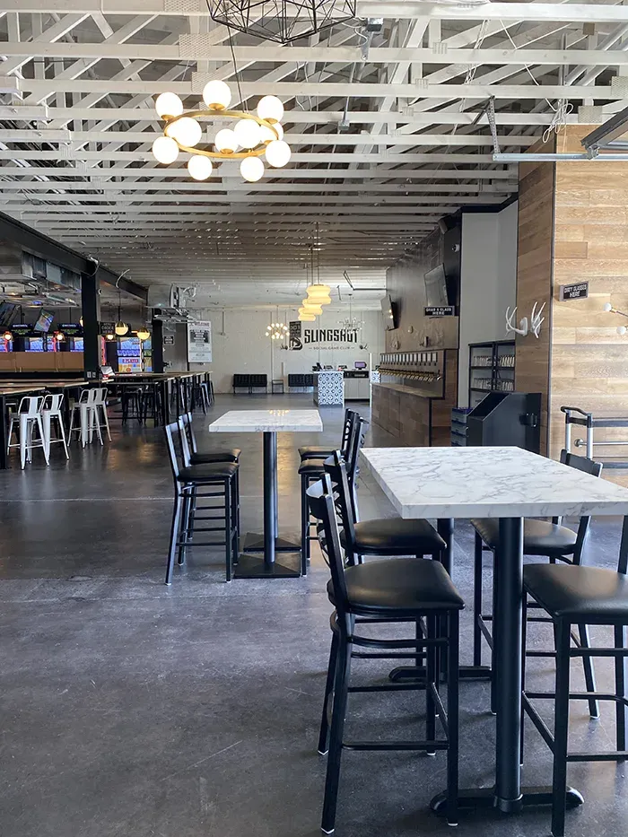 14 800 square foot bar and social game club called Slingshot is