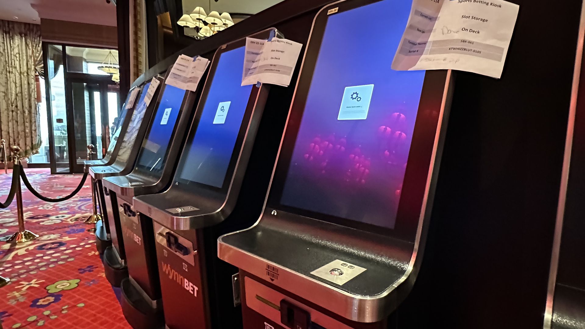 A handful of kiosks appear in front of Encore's sports restaurant, On Deck, and are roped off and not operational until the state's sports betting launch on Jan. 31.