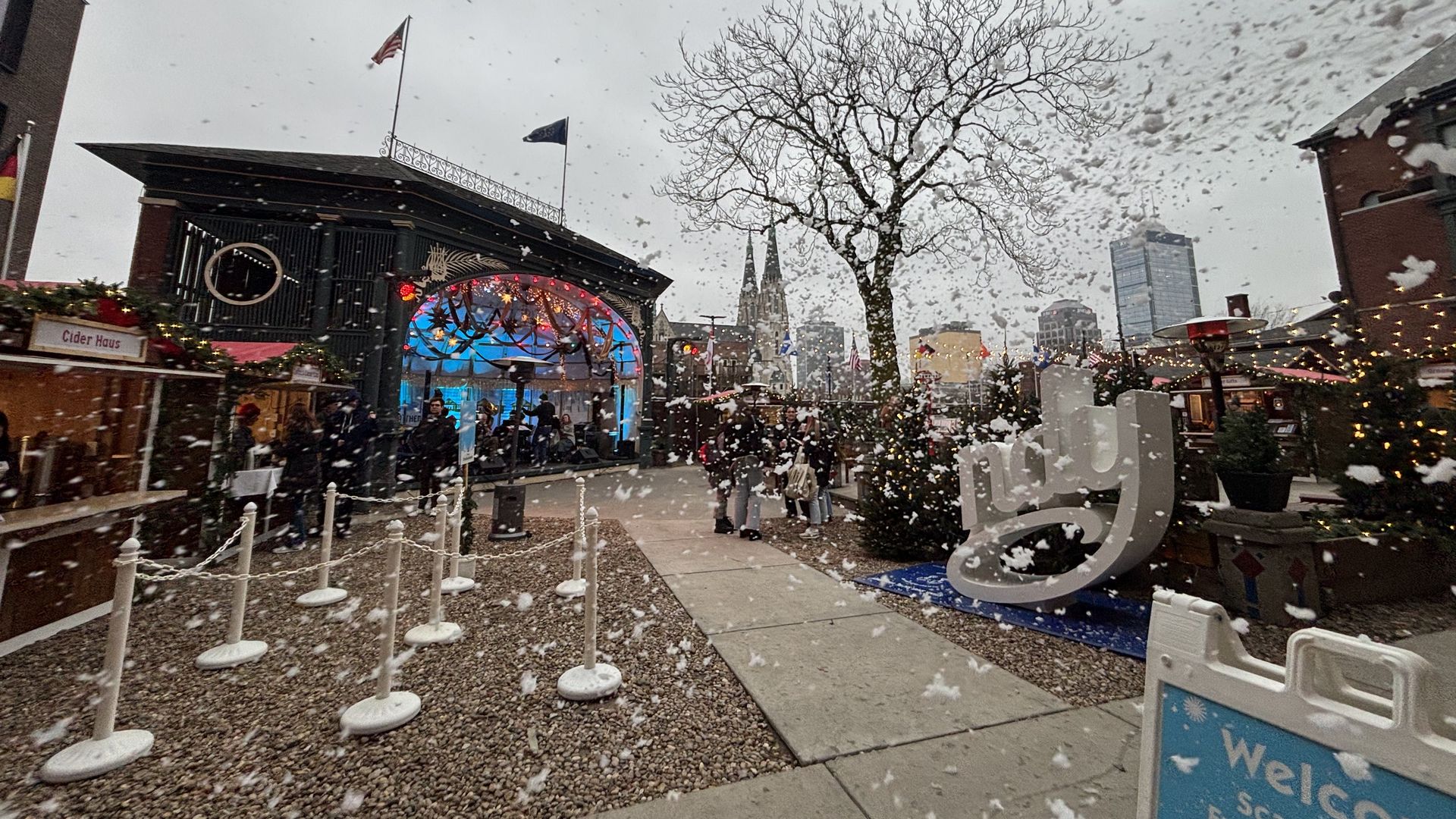 Fake snow falls on a german Christmas market