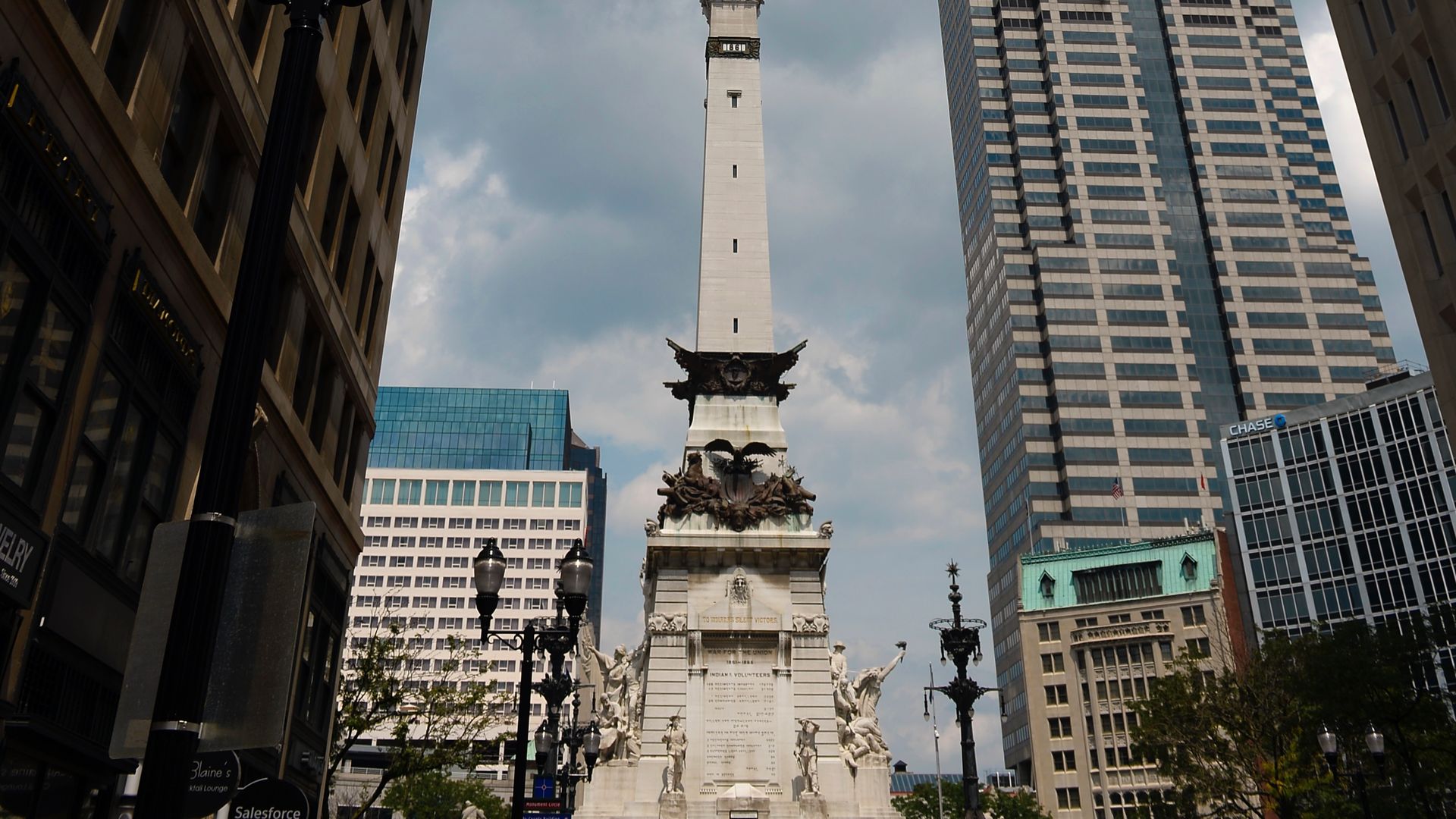 A monument surrounded by buildings