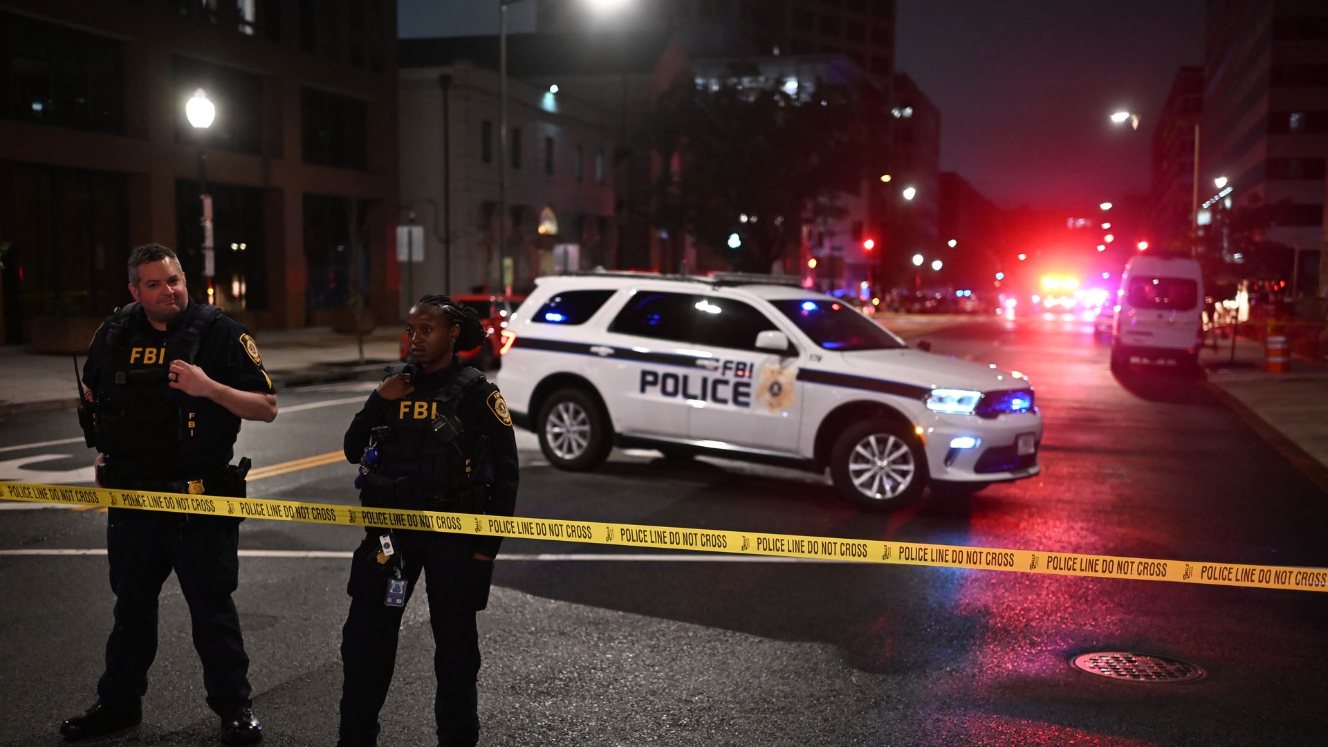 FBI agents cordon off the scene outside the Capital Jewish Museum following a shooting that left two people dead, in Washington, DC, in the early hours of May 22, 2025. Two Israeli embassy staffers were shot dead late Wednesday, May 21, outside a Jewish museum in Washington by a gunman who shouted "