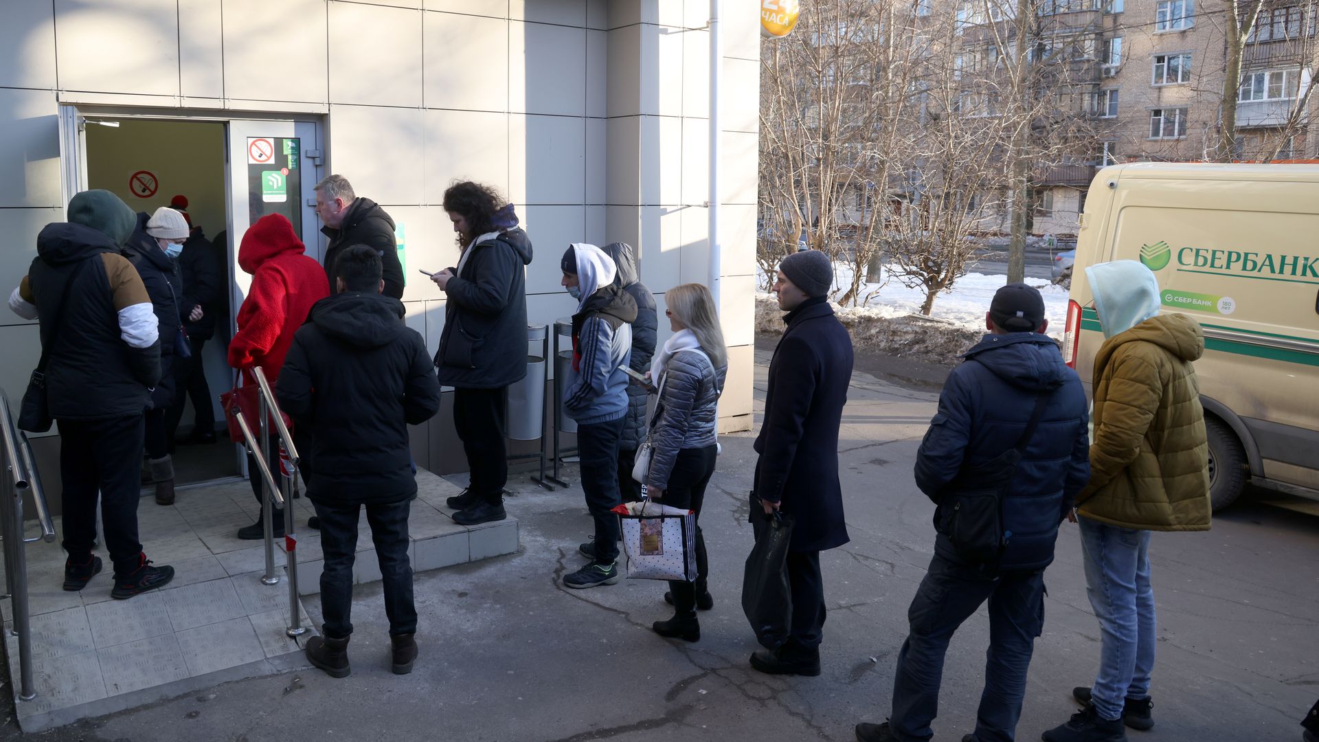 People line up at a bank in Moscow, Russia, on 24 February.