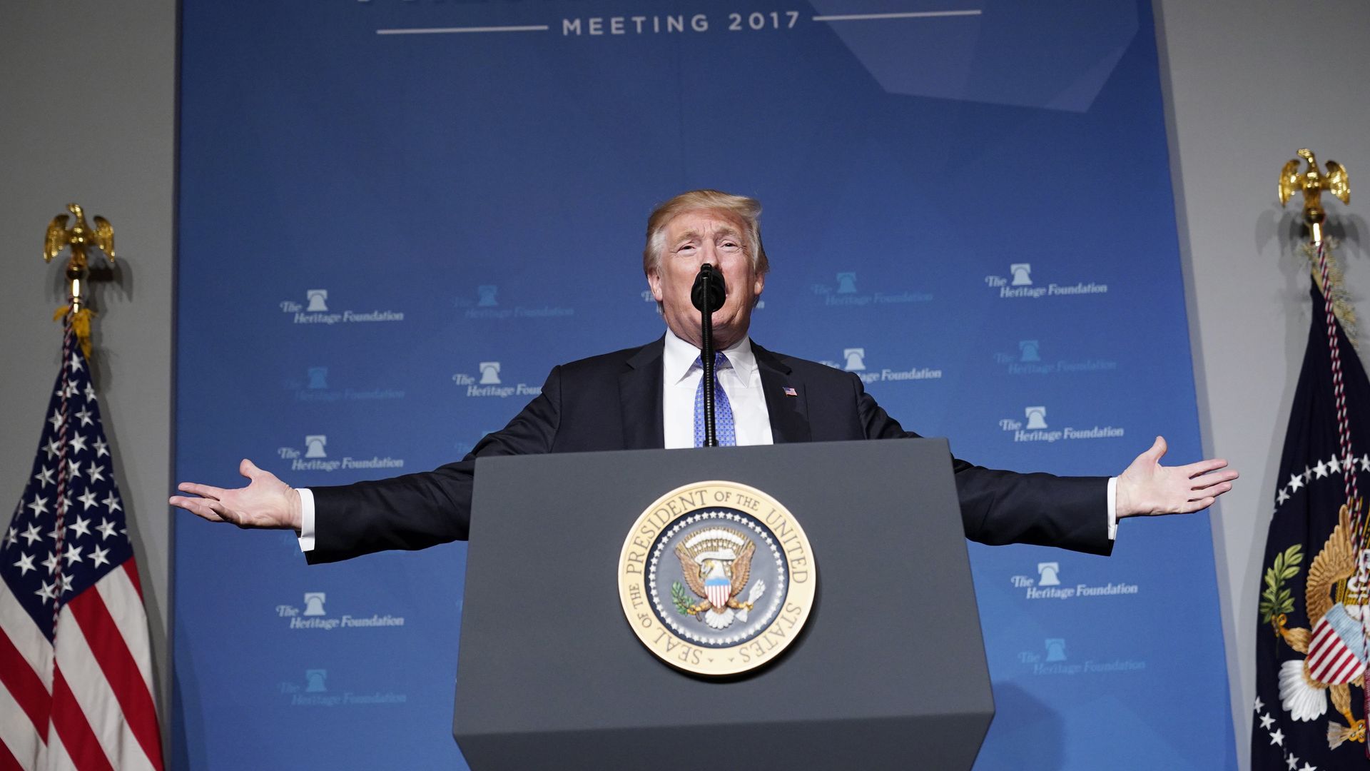 Donald Trump giving a speech.
