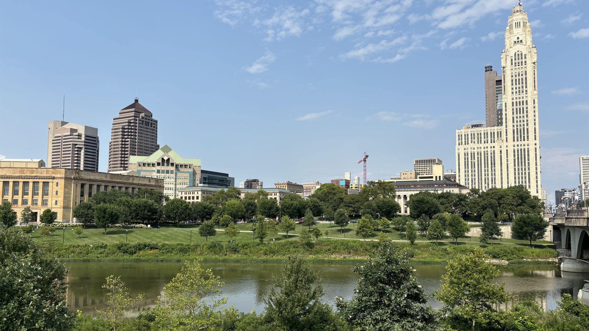 A photo of Columbus skyline with river