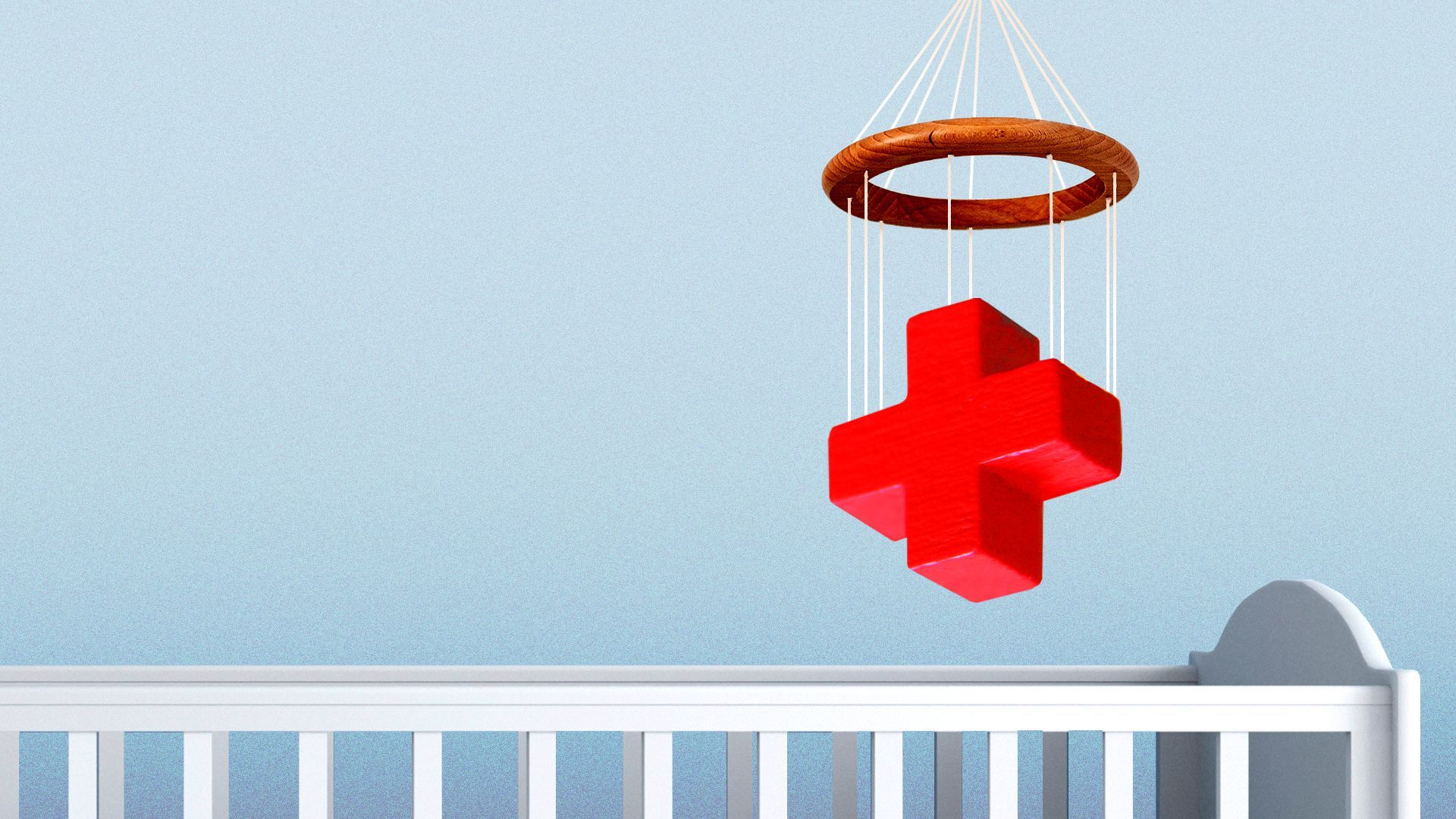 Illustration of a crib sitting beneath a mobile with a hanging medical cross.