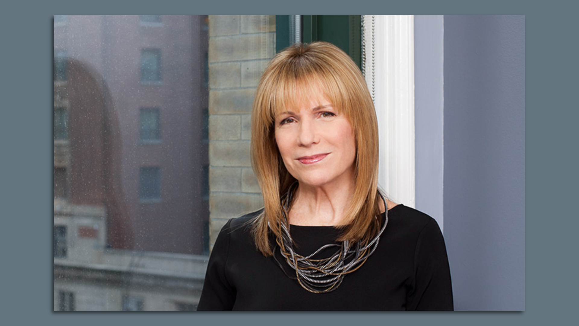 woman in front of window