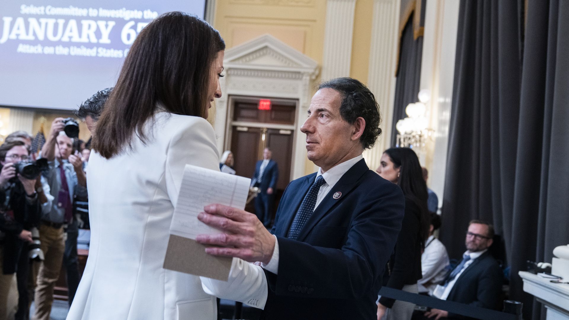 Cassidy Hutchinson with Jamie Raskin