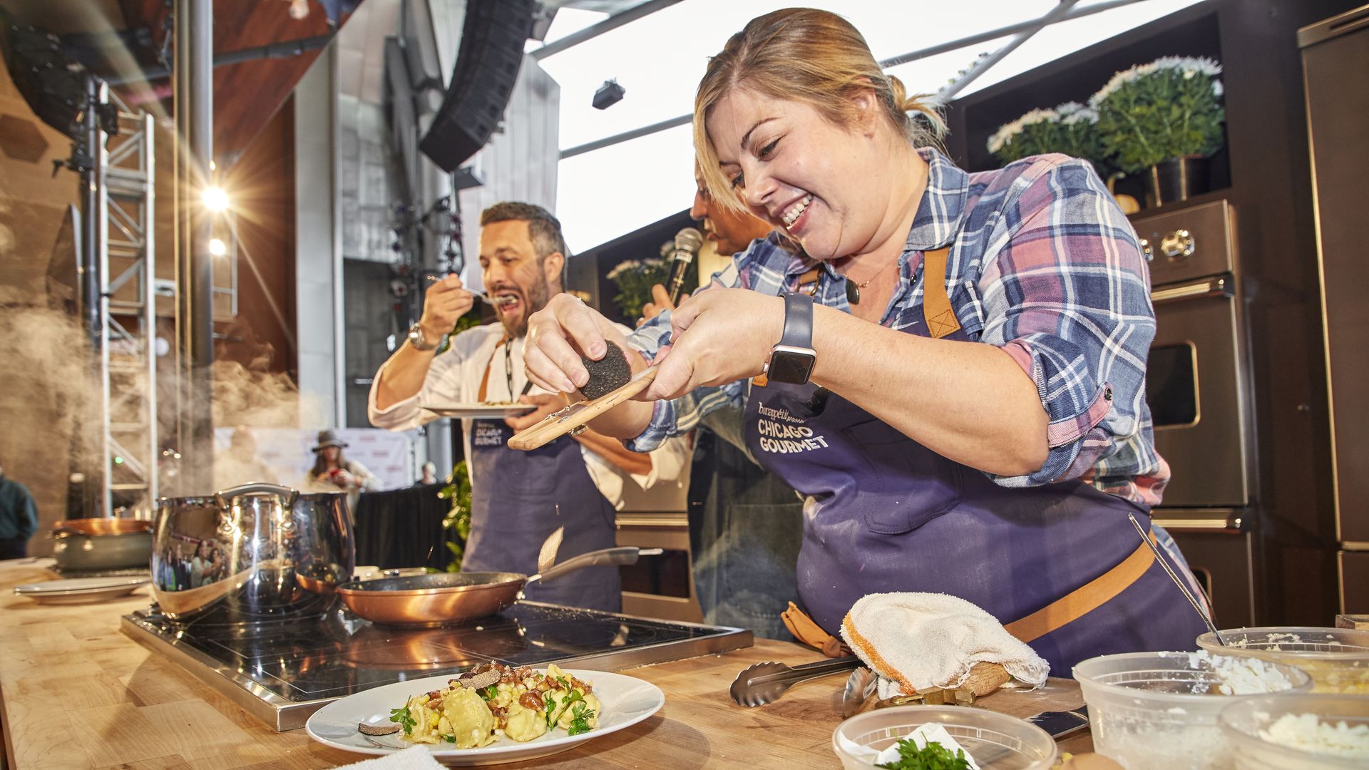 chef shaving truffles on food