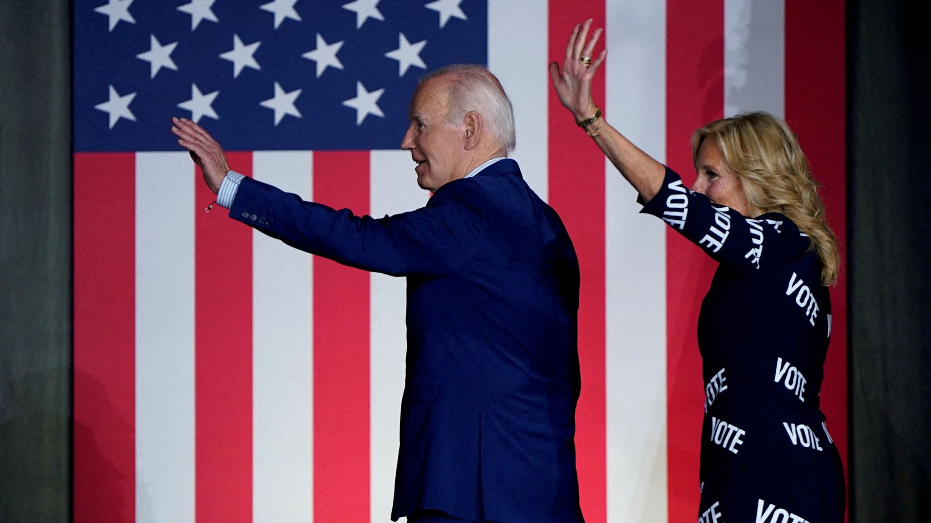 S. President Joe Biden and first lady Jill Biden wave as they exit the stage during a campaign rally in Raleigh
