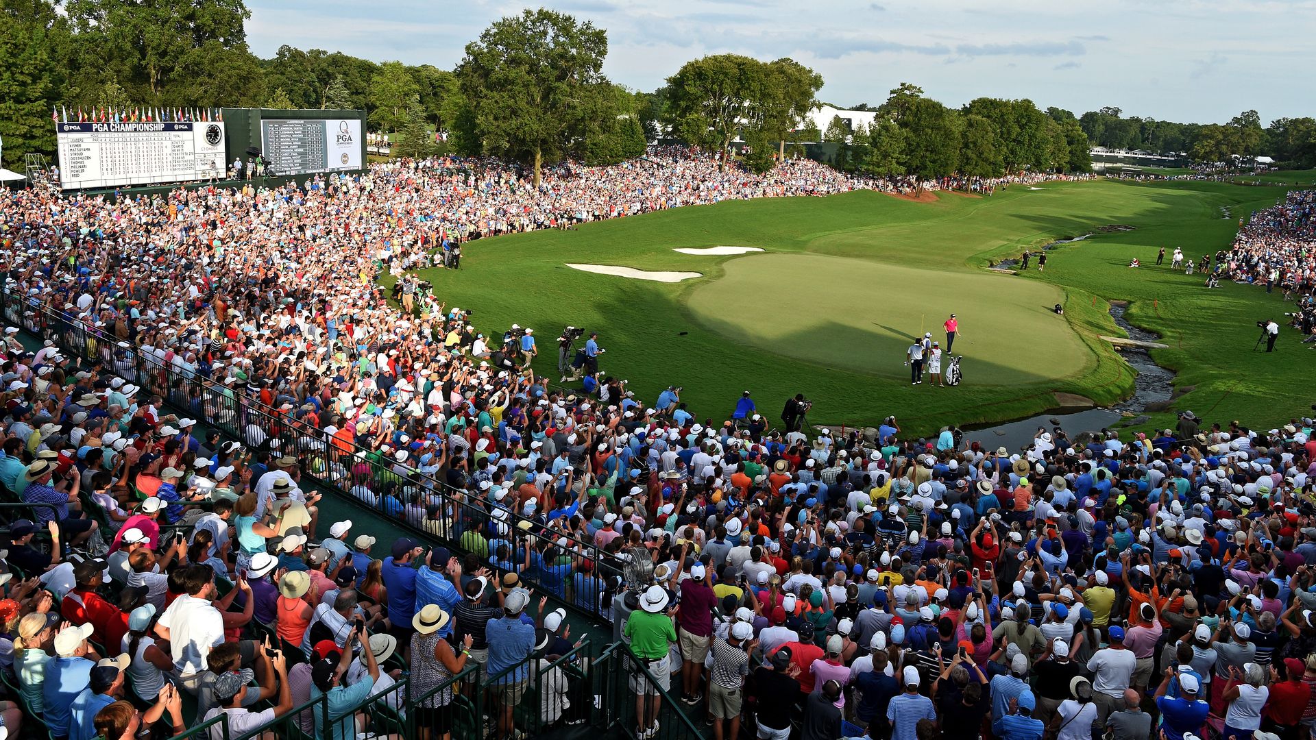 Justin Thomas of the United States reacts to his putt on the 18th green with an -8 finish during the final round of the 2017 PGA Championship at Quail Hollow Club on August 13, 2017 in Charlotte, North Carolina. (Photo by Ross Kinnaird/Getty Images)