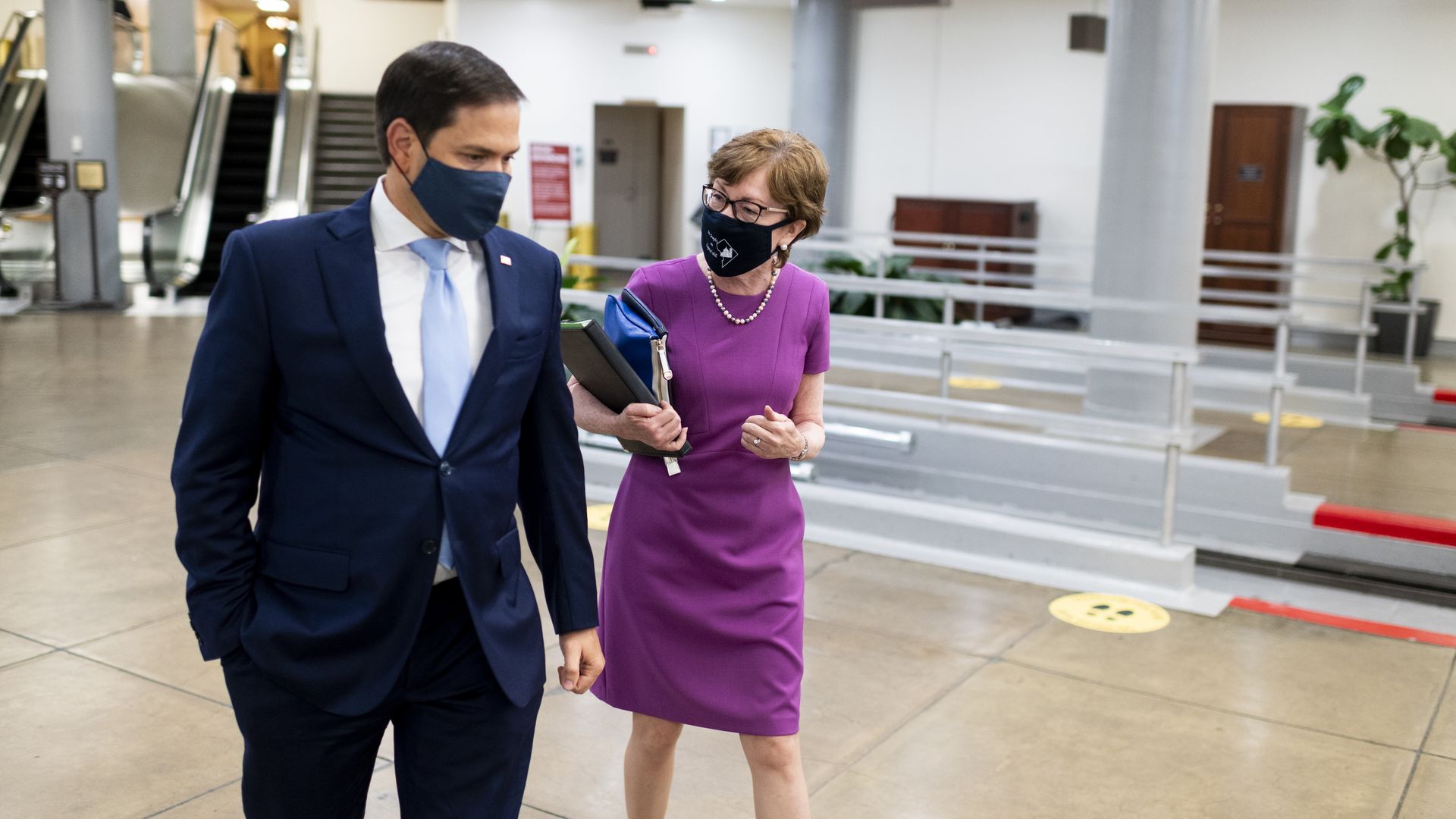 Senators Marco Rubio and Susan Collins talk in the Senate subway