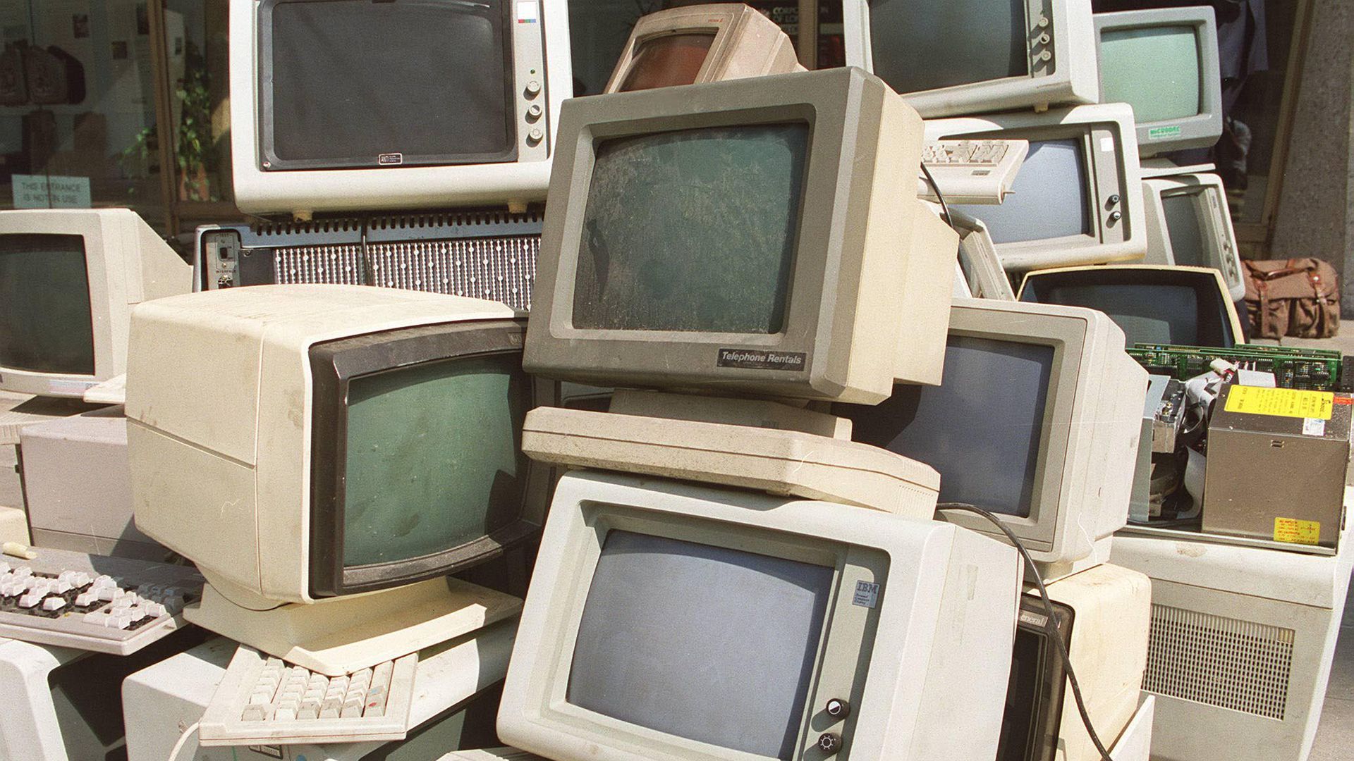 A heap of old computer monitors from the '80s ands '90s