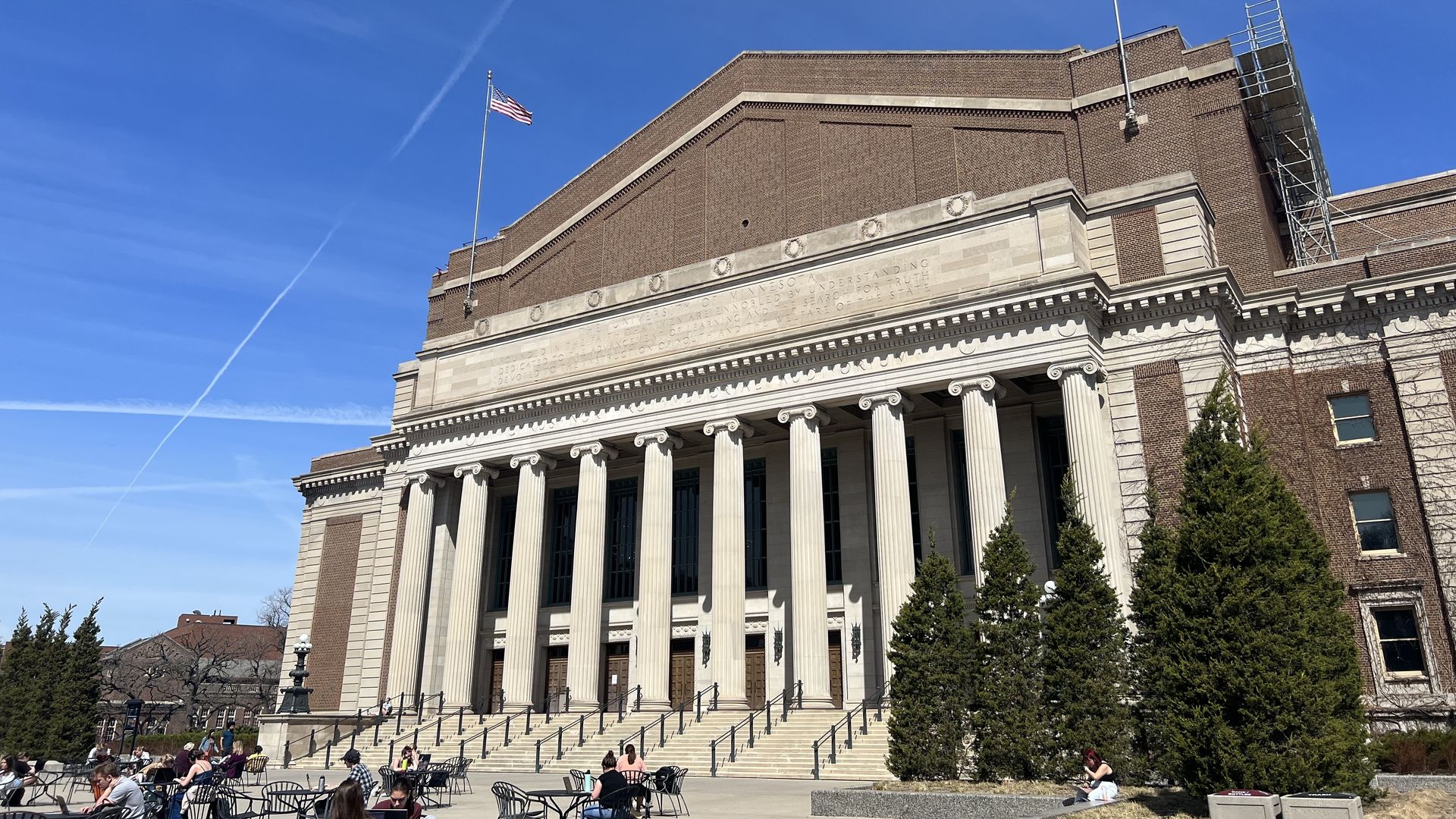 The University of Minnesota's Northrop Auditorium - a large building with concrete columns in a neoclassical style and a red brick facade above