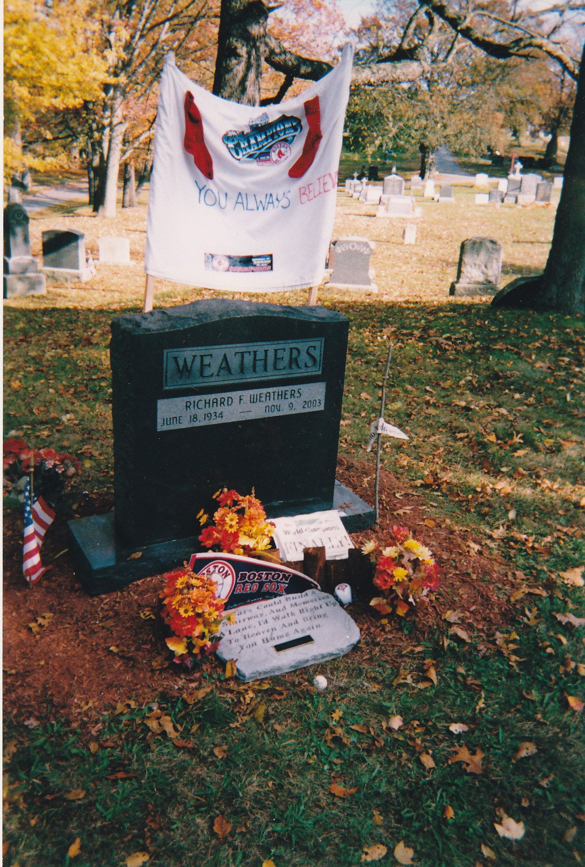 Grave covered in Red Sox gear