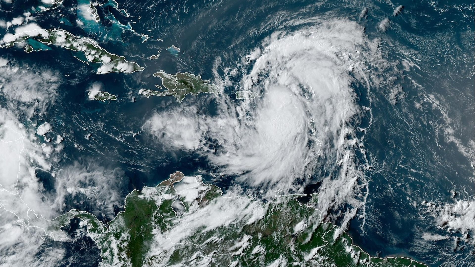 Satellite image of an intensifying Tropical Storm Ernesto on August 13 as it moves toward Puerto Rico.