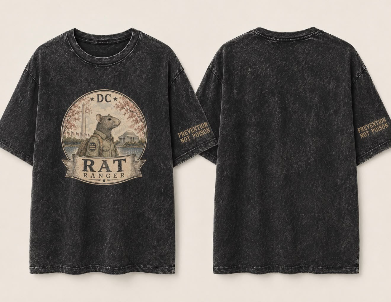 Washed black T-shirt with a large circular front graphic: a rat in a ranger uniform before DC landmarks; text reads "DC RAT RANGER". The left sleeve reads "PREVENTION NOT POISON".