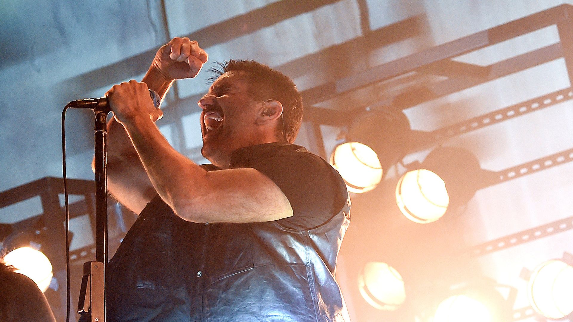 Trent Reznor of Nine Inch Nails performs ons tage. 