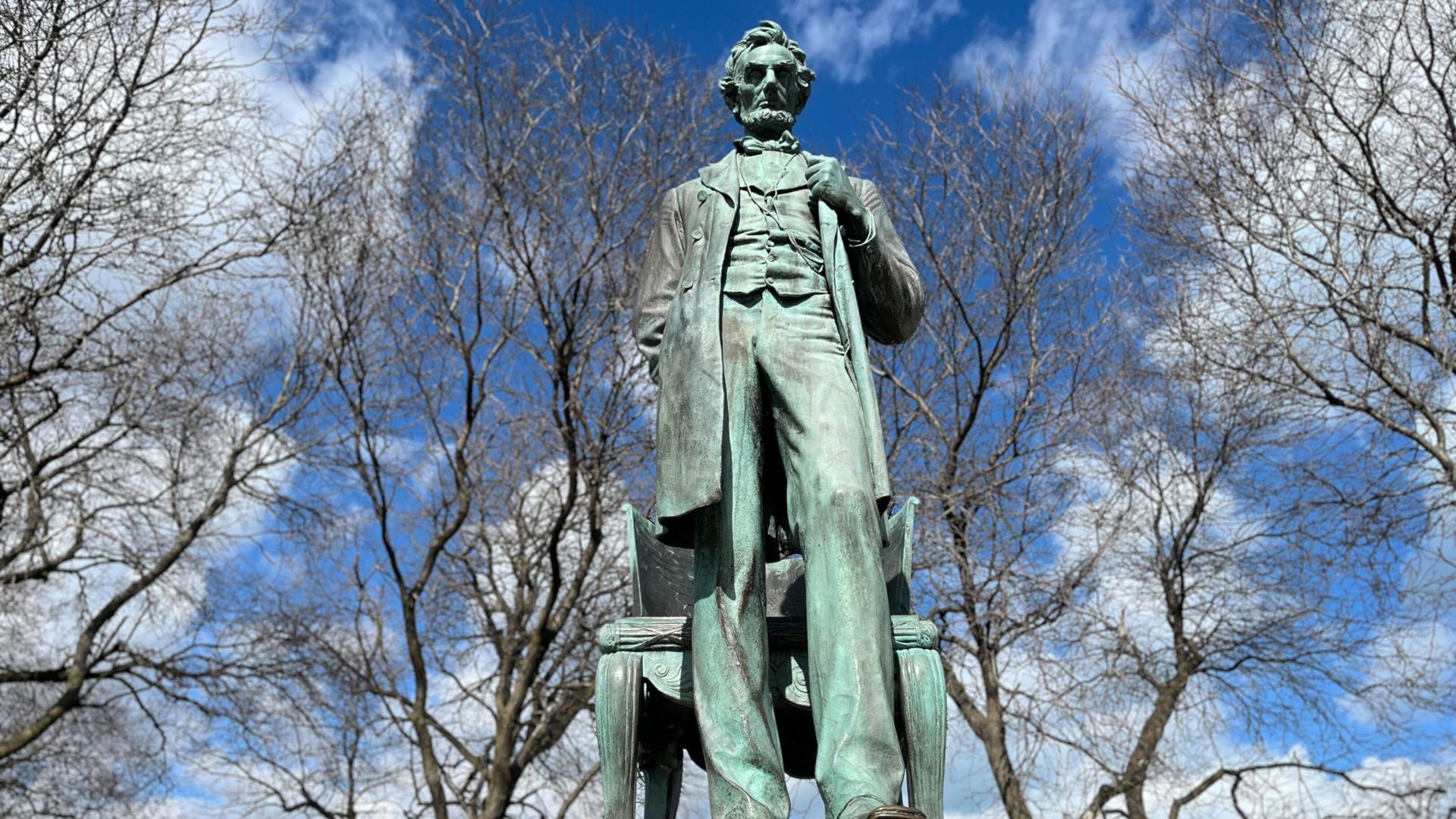 Photo of a statue surrounded by trees 