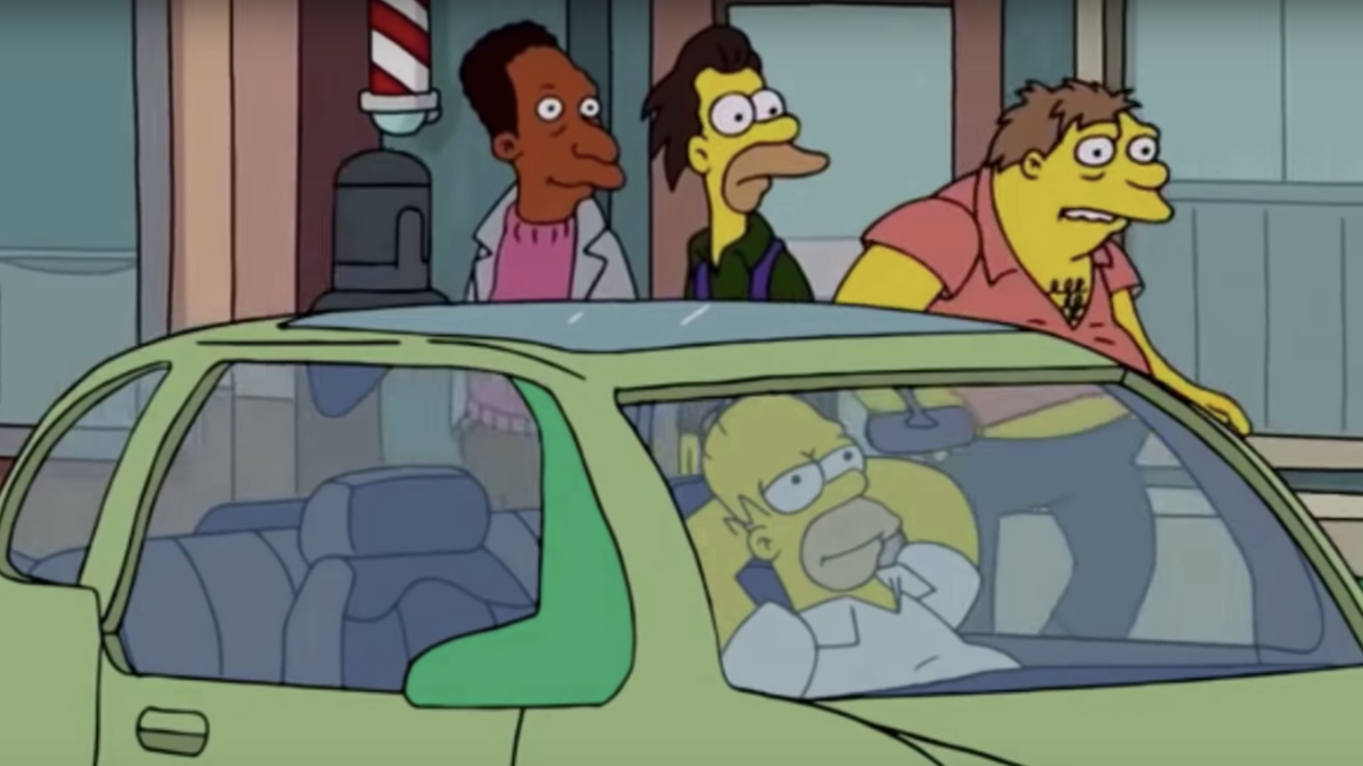 Fox screen shot of Homer Simpson relaxing while testing a self-driving car.