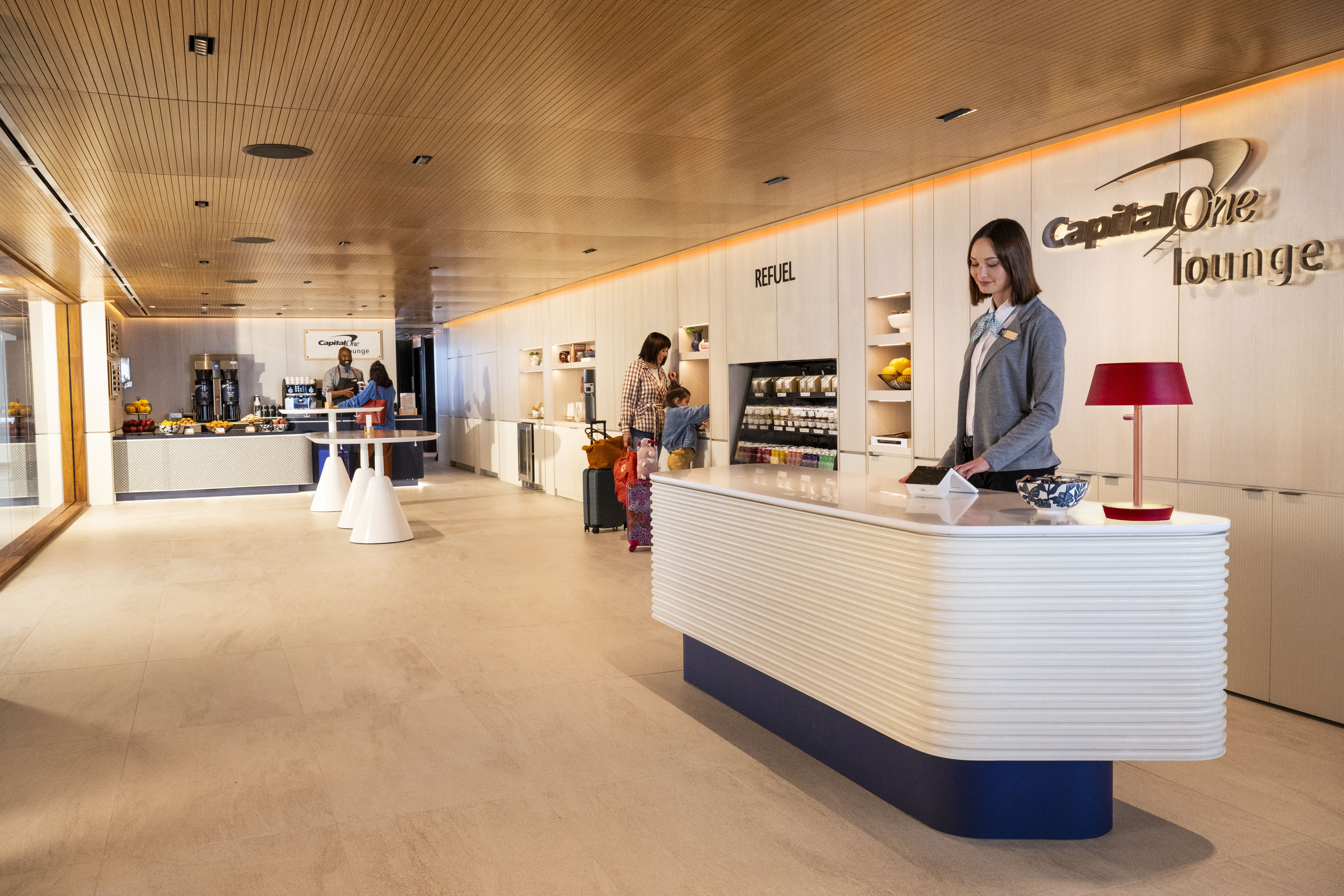 The entrance to the Capital One lounge with grab and go food items in the background