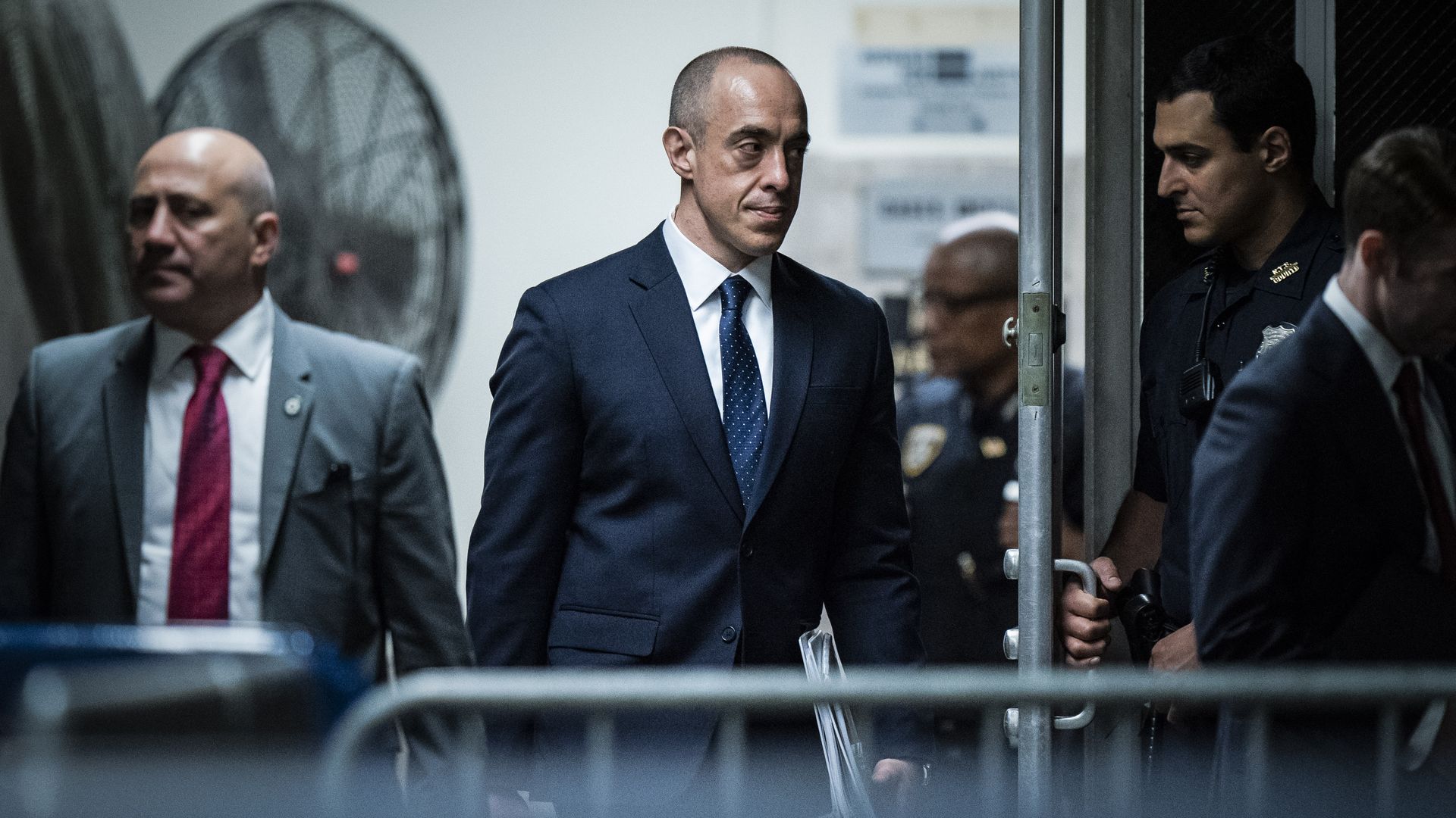 Emil Bove walking through a door