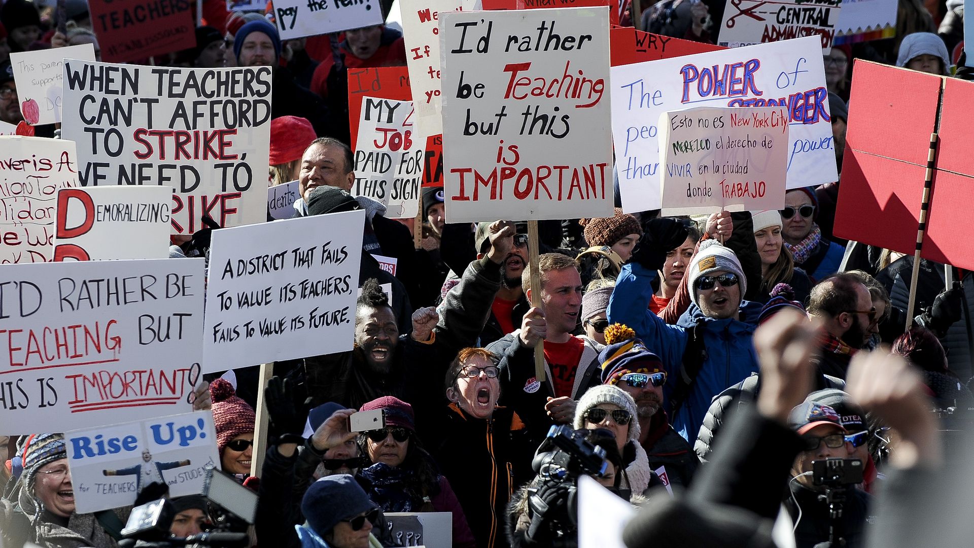 Denver teachers and supporters rally at the Colorado State Capitol on Monday. 