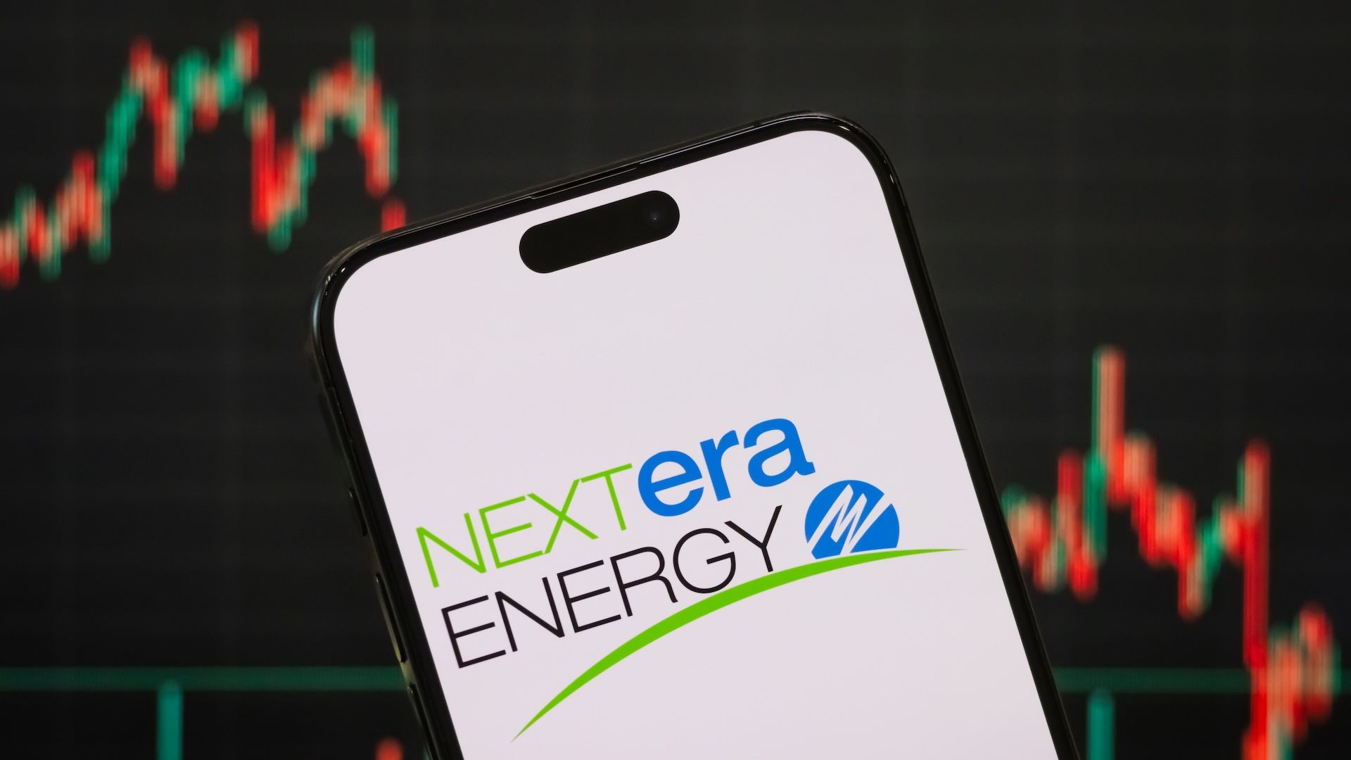 Photo of the NextEra Energy logo on a smartphone