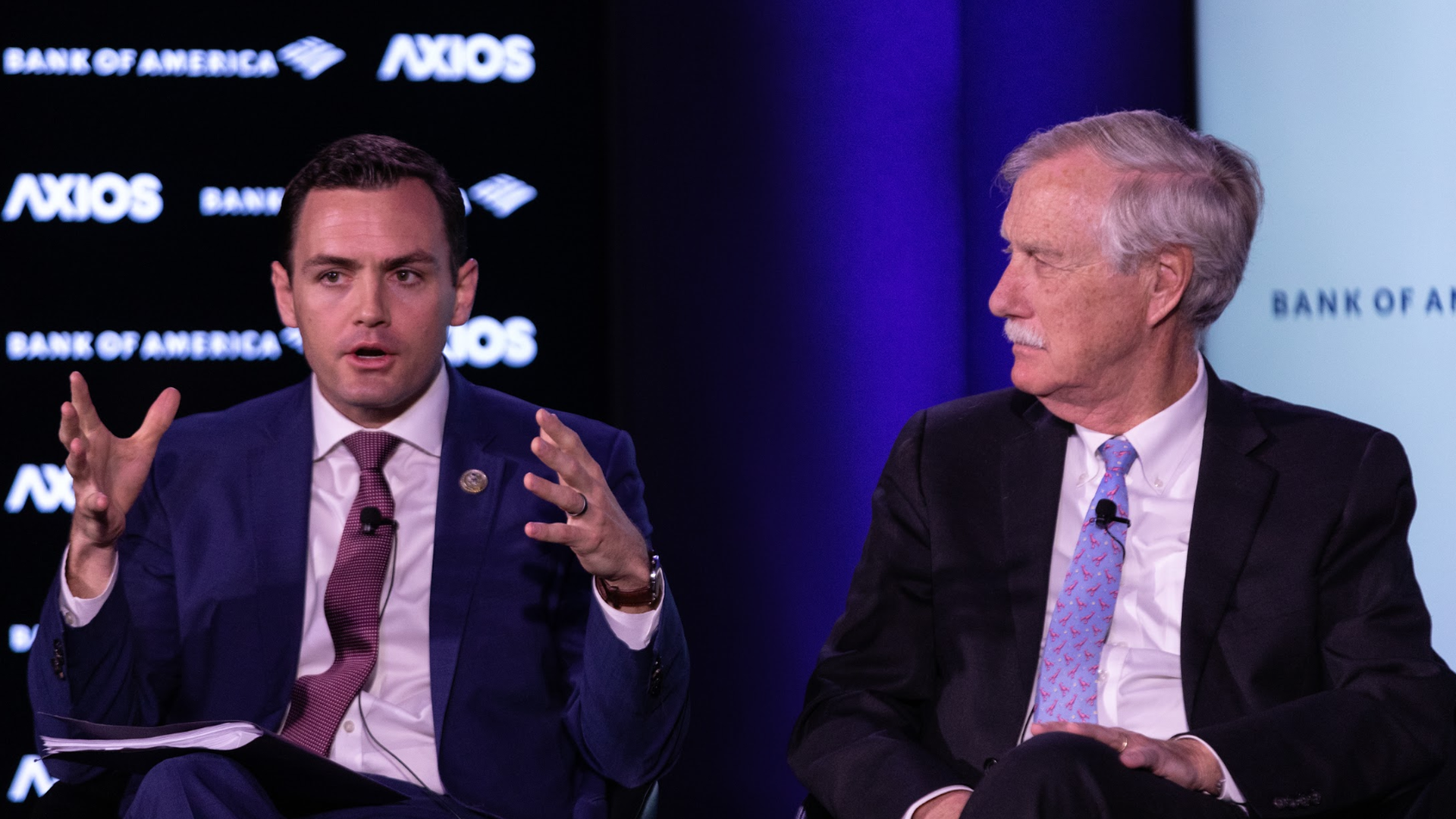 Left, Rep. Mike Gallagher, Right, Sen. Angus King both seated on the Axios stage.