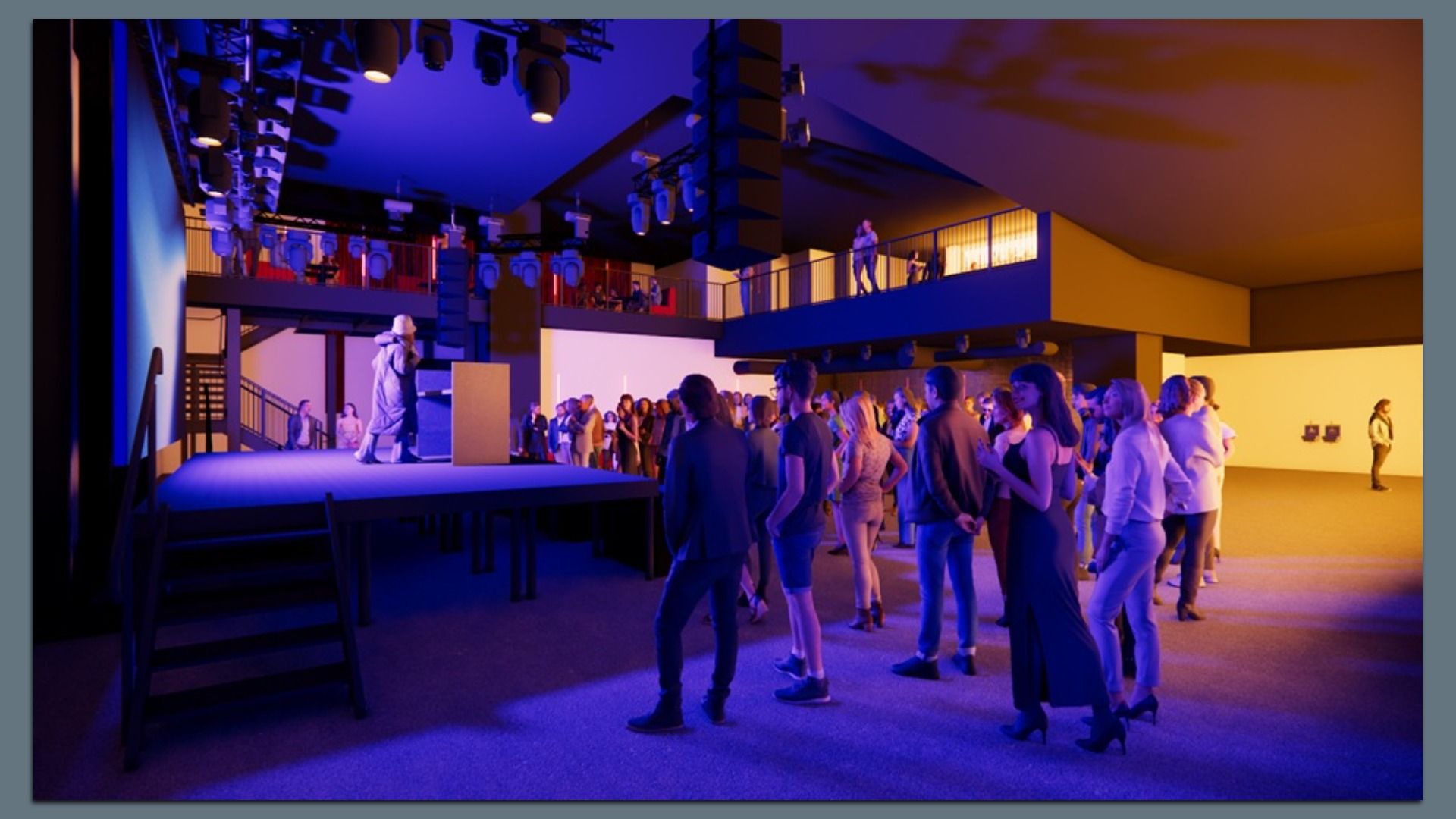 People gathered in a large, modern indoor venue with blue and yellow lighting, watching a speaker on an elevated stage. Some people are on a balcony above.