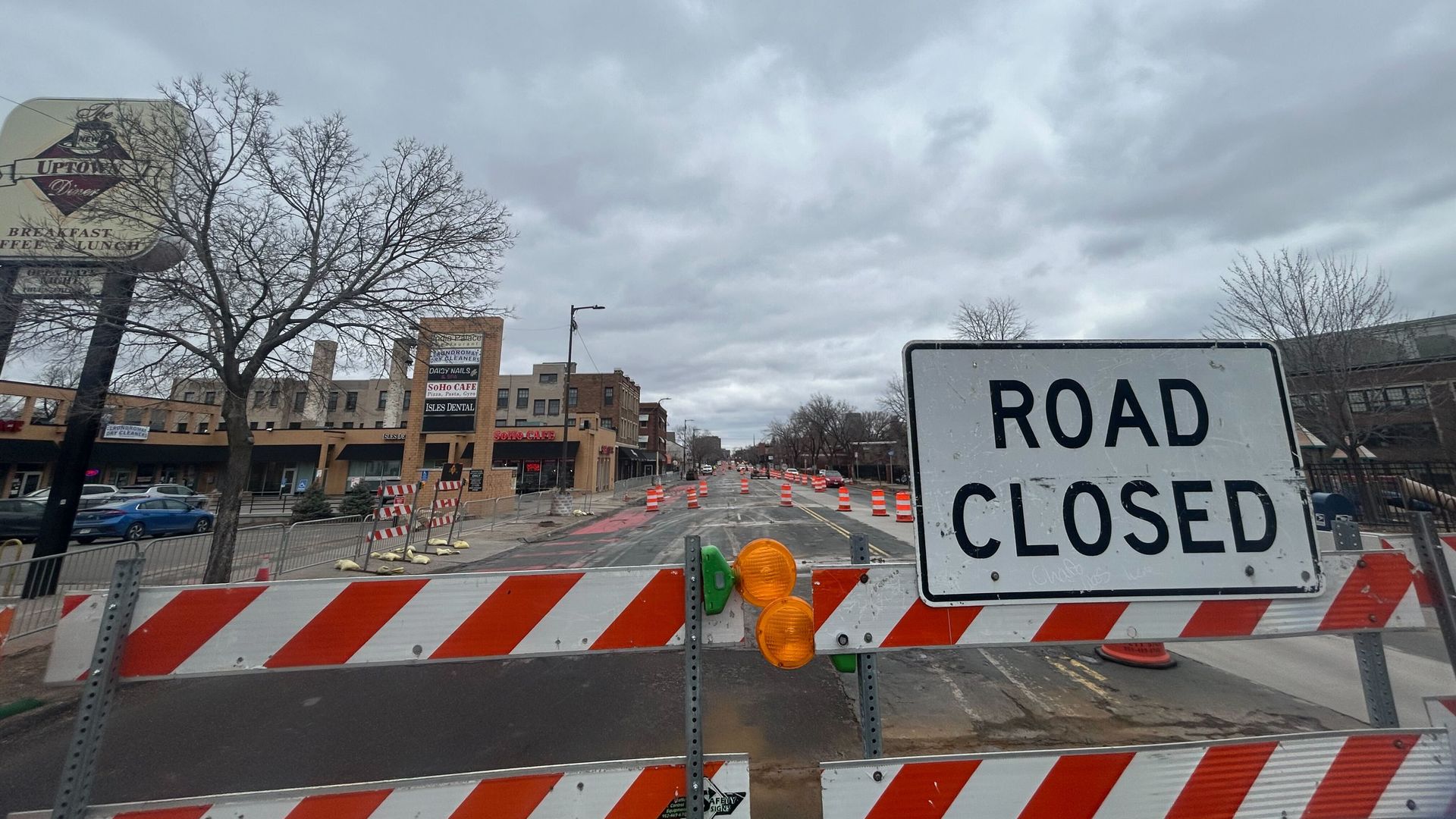 A road closed sign on a city street