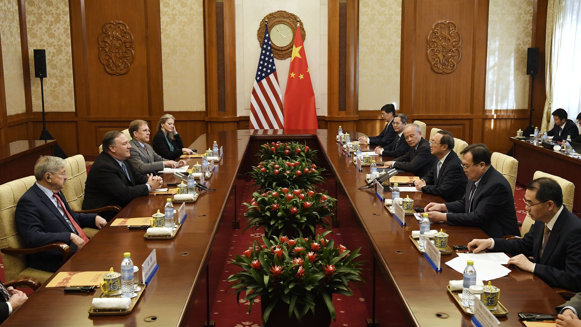U.S. and Chinese delegations sit across from one another.